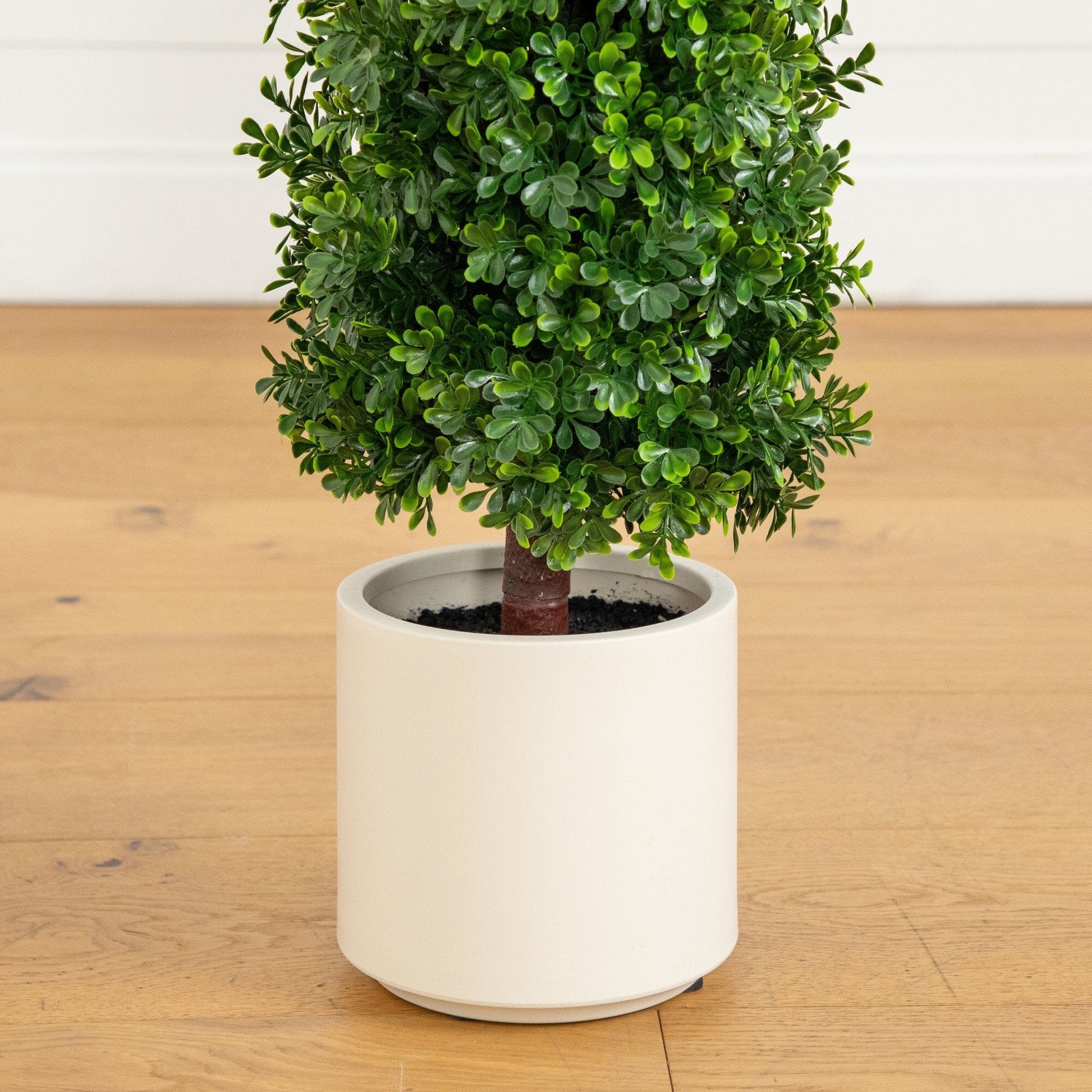 34in UV resistant boxwood topiary cone tree in white planter by Nearly Natural on Tampa Home & Garden Store
