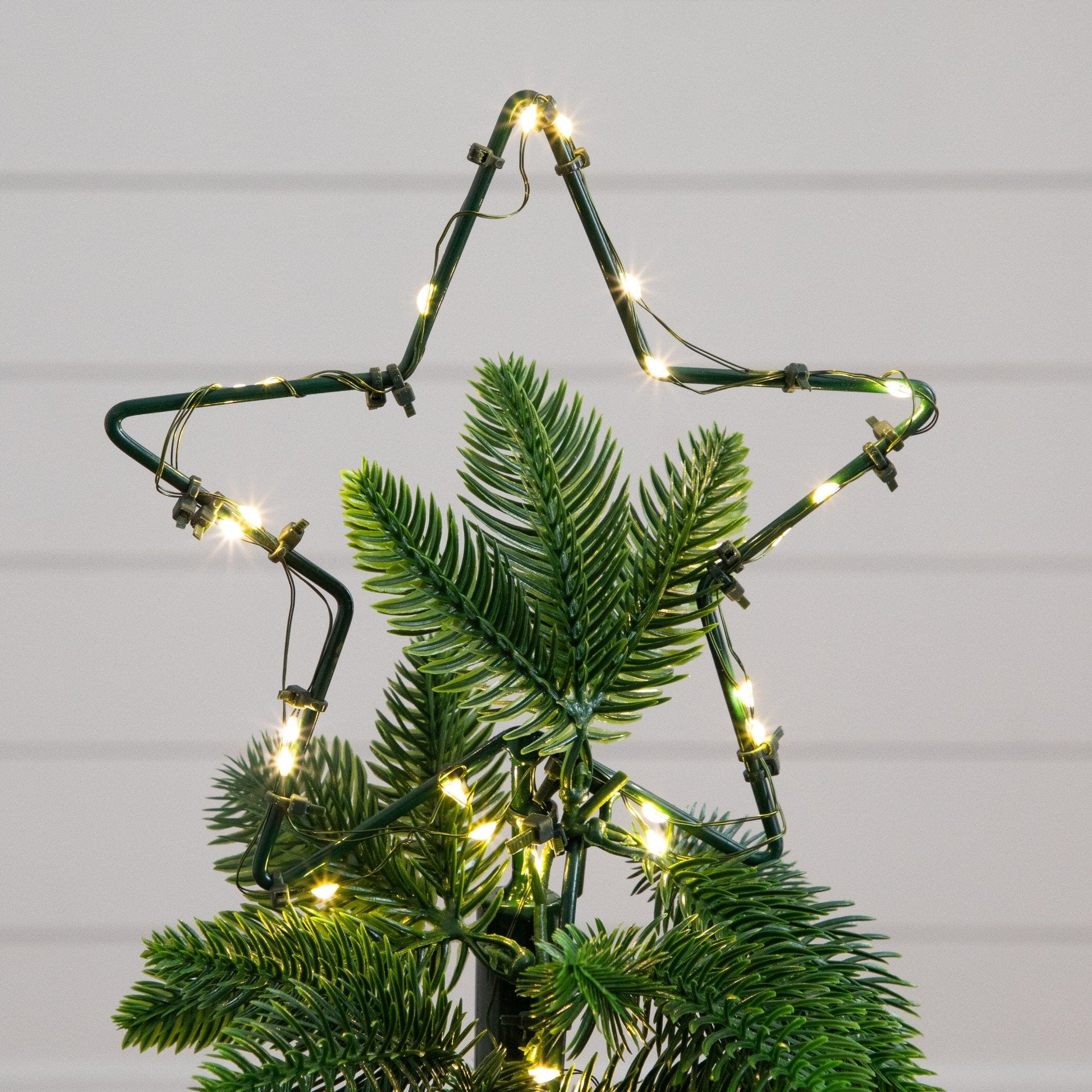 34in UV-resistant pre-lit spiral Christmas tree with 45 LED lights and bow topper on Tampa Home & Garden Store