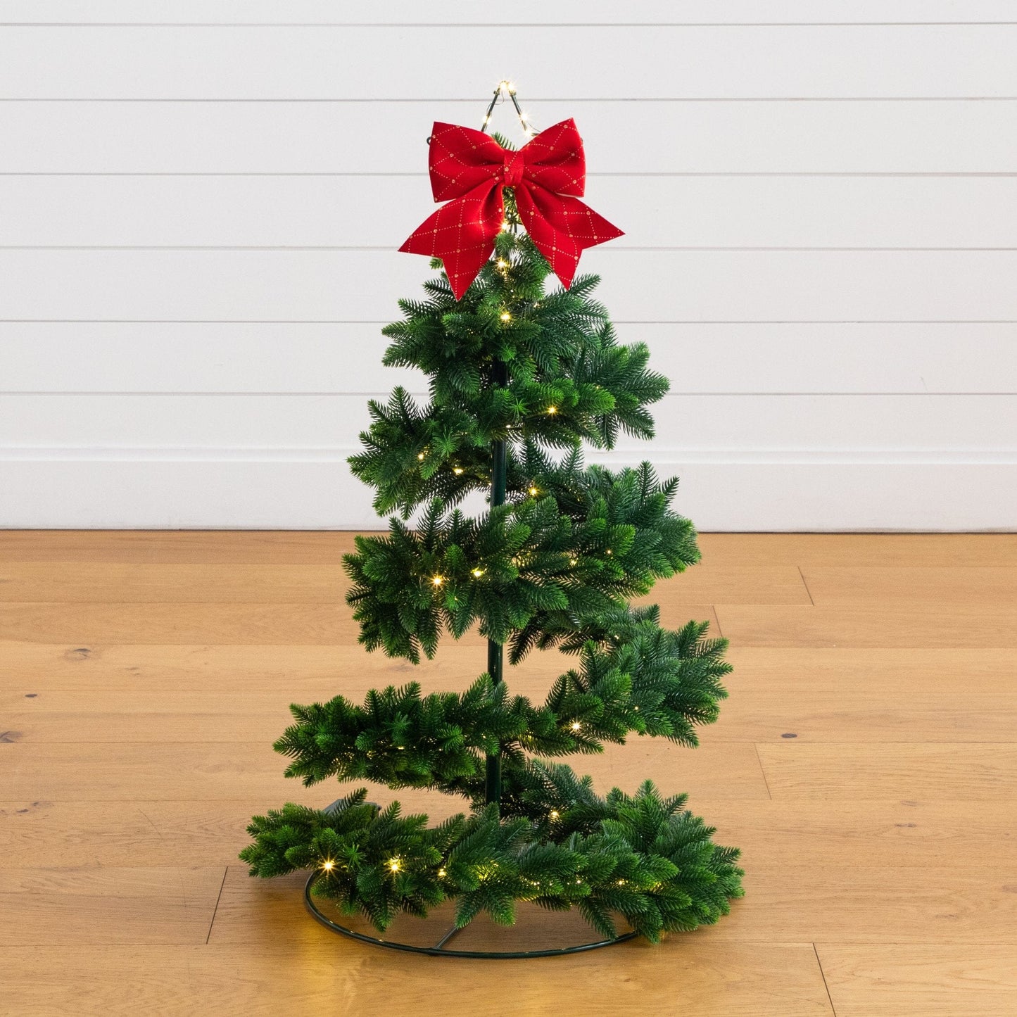 34in Nearly Natural UV-resistant pre-lit spiral Christmas tree with 45 LEDs and red bow topper on Tampa Home & Garden Store