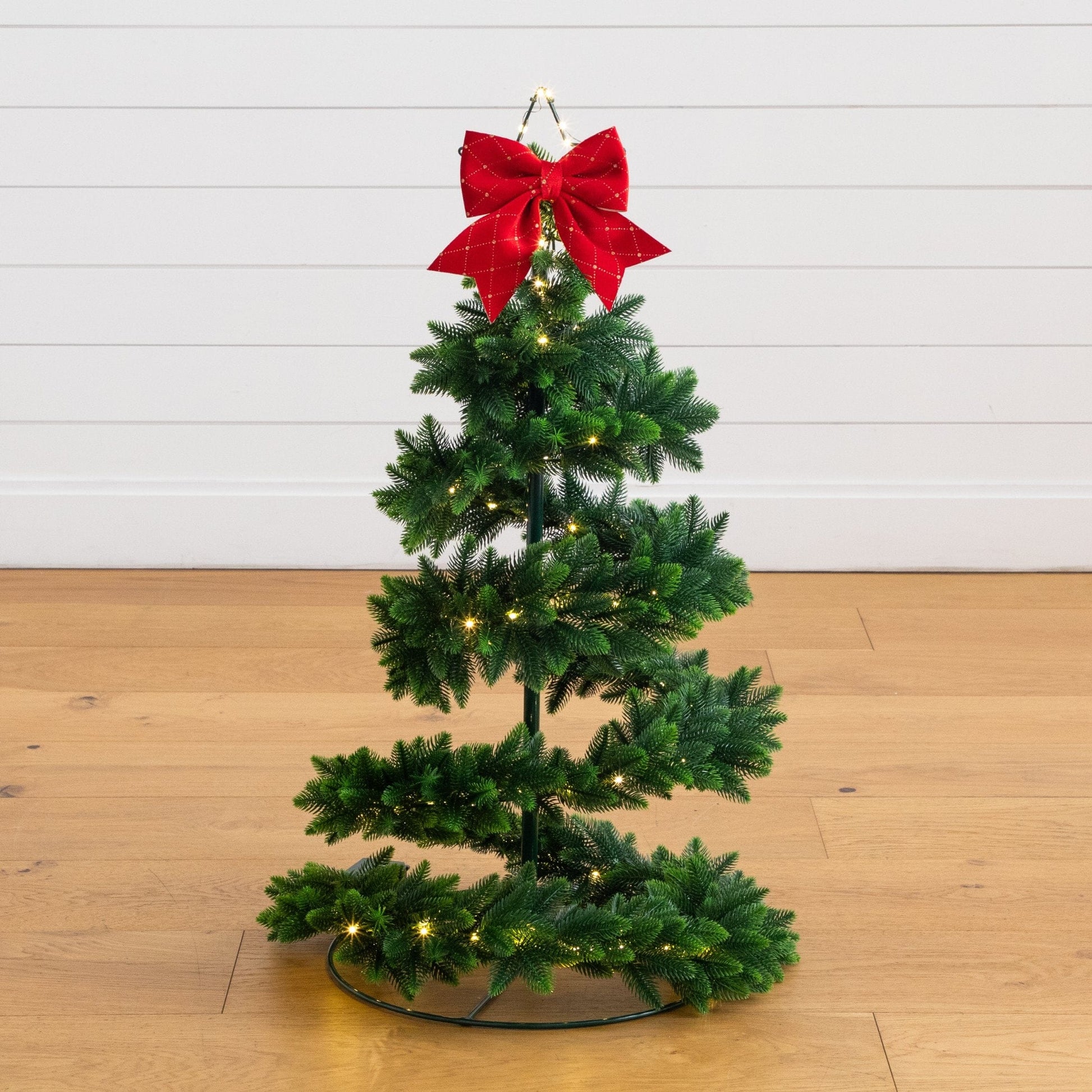 34in Nearly Natural UV-resistant pre-lit spiral Christmas tree with 45 LEDs and red bow topper on Tampa Home & Garden Store