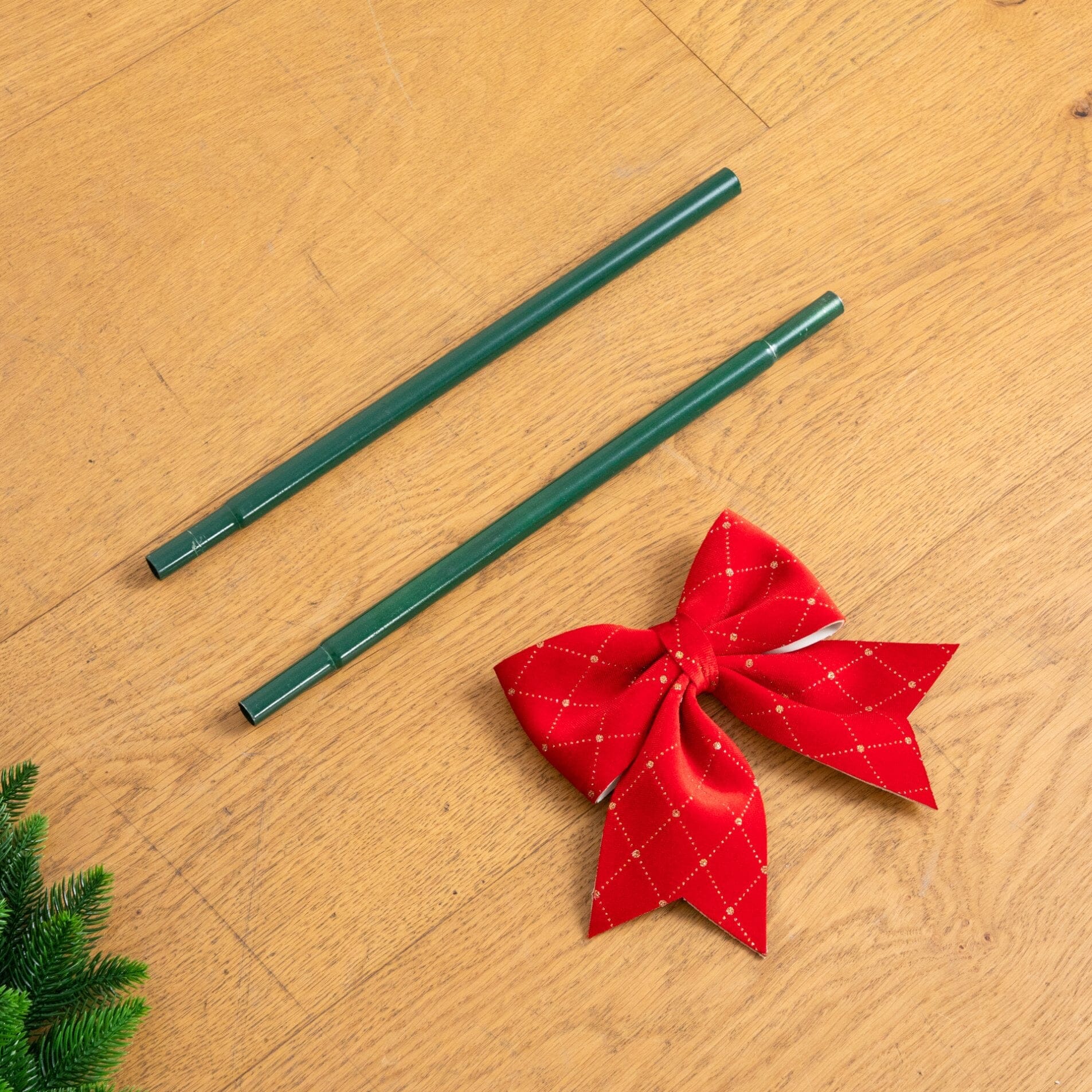 Nearly Natural 34in UV-resistant spiral pre-lit tree parts: green poles with red bow topper on Tampa Home & Garden Store
