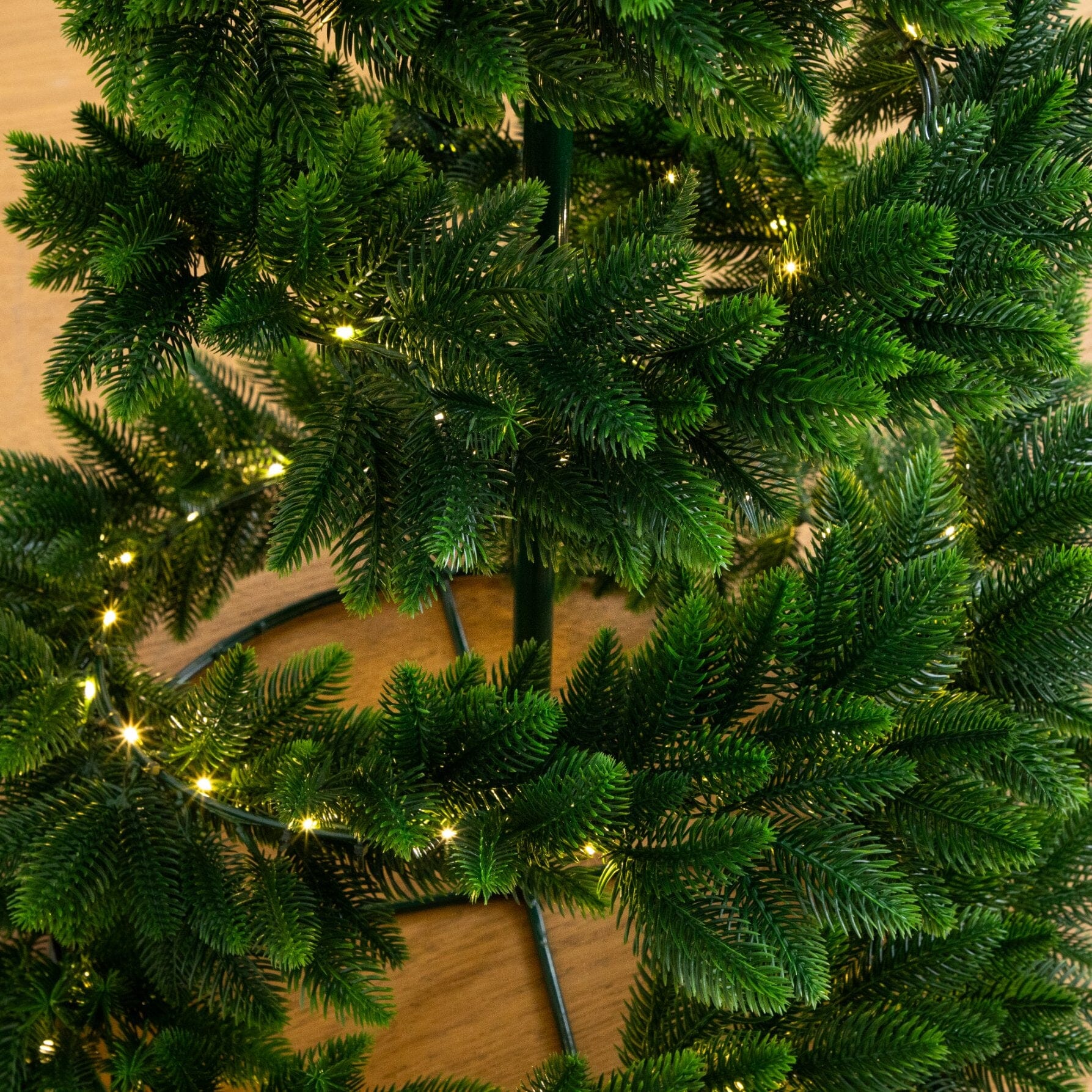 34in UV-resistant pre-lit spiral Christmas tree by Nearly Natural with warm LED lights on Tampa Home & Garden Store