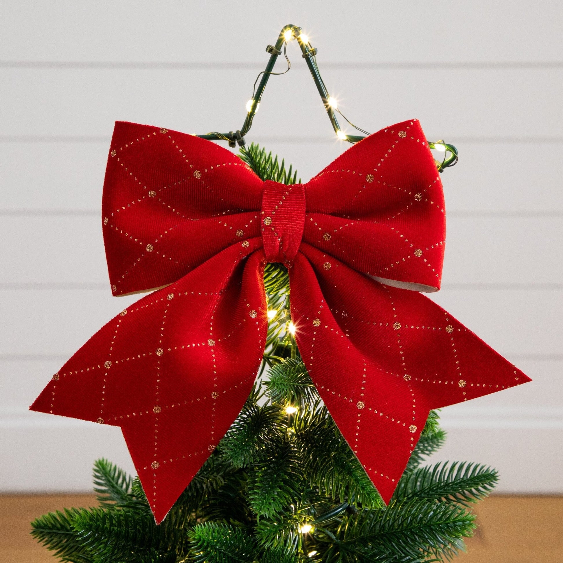 34in UV-resistant pre-lit artificial spiral pop-up Christmas tree with red bow topper and warm LEDs on Tampa Home & Garden Store