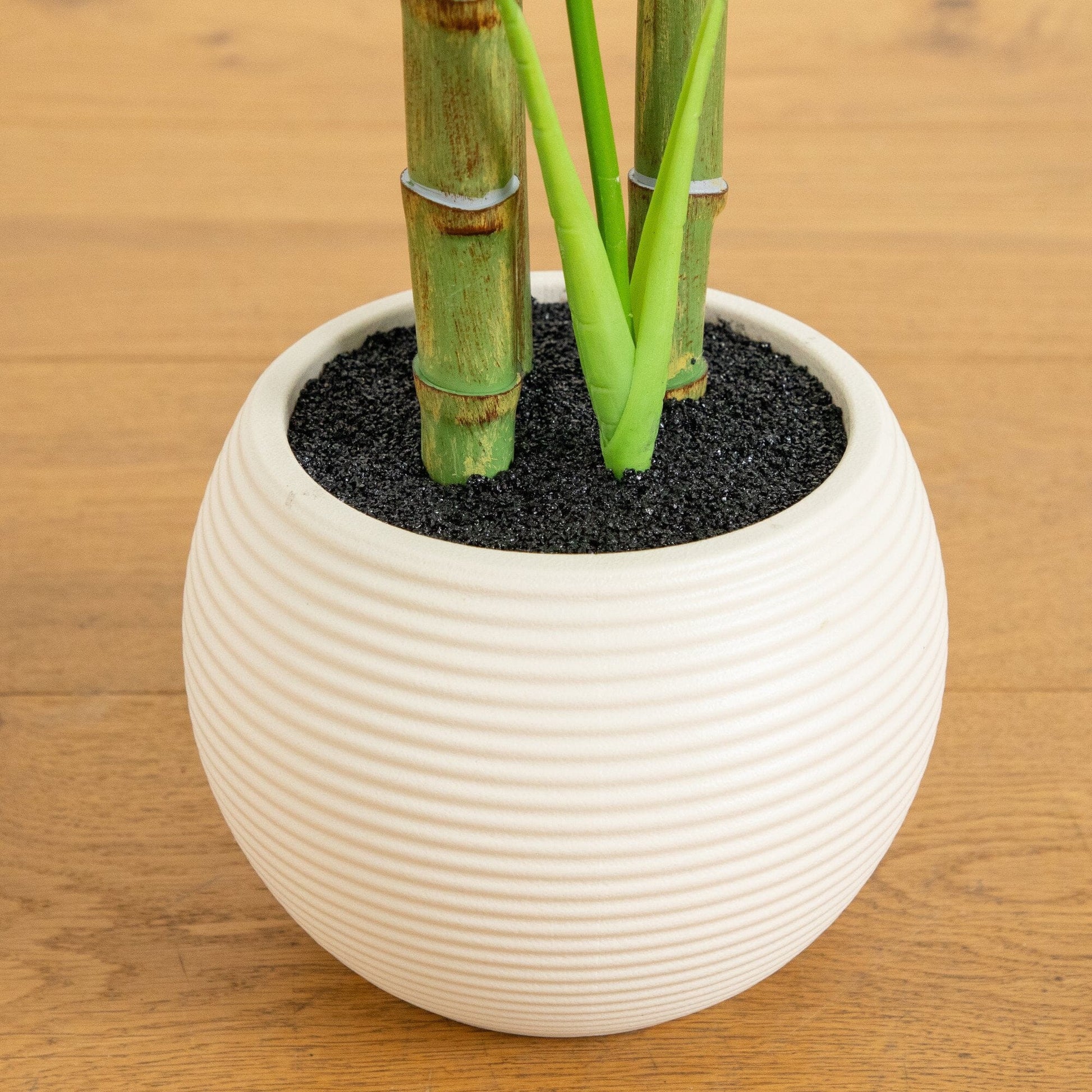 3.5' artificial Areca Palm Tree in white round planter by Nearly Natural with dark soil on Tampa Home & Garden Store