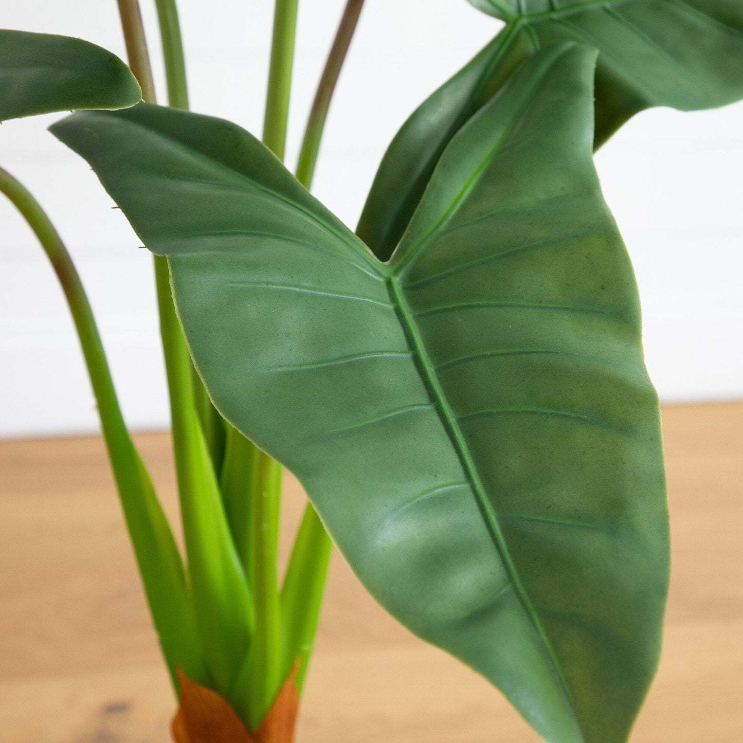 Artificial Arrowhead Plant in the White Planter