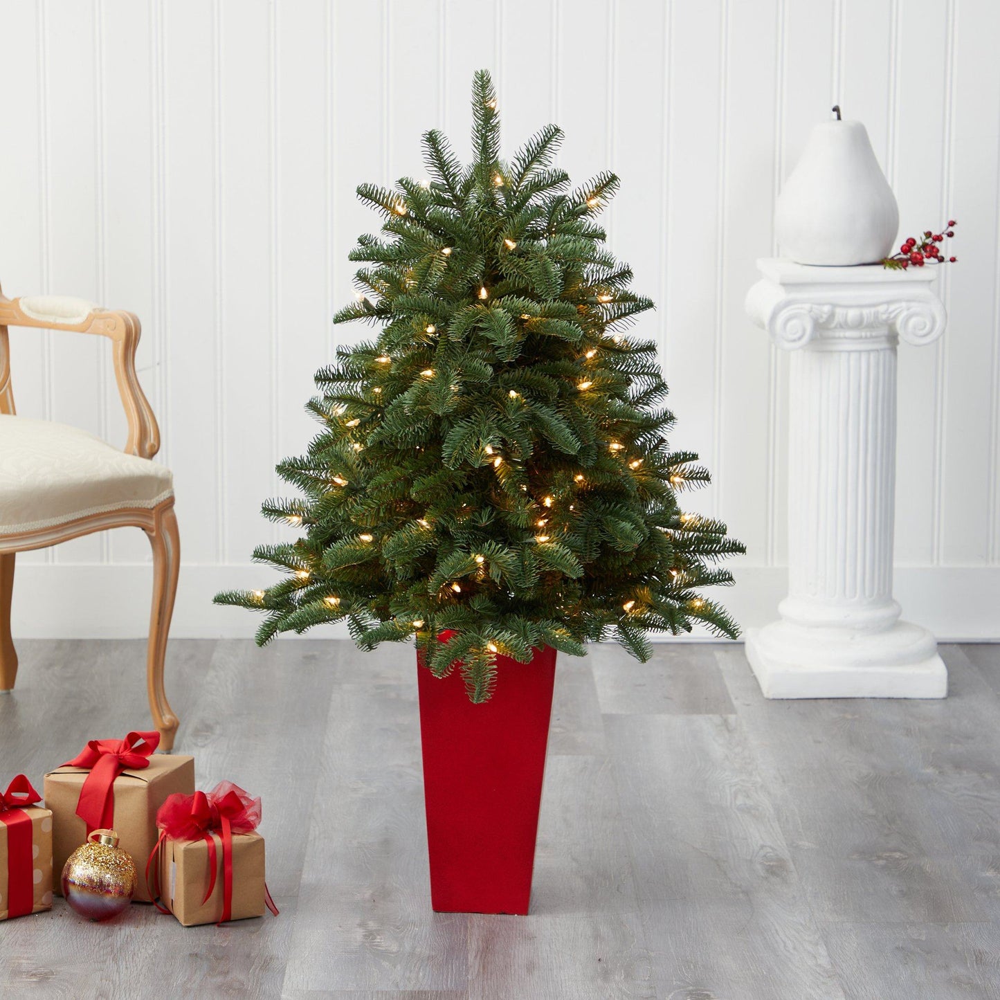 3.5’ Spruce tree by Nearly Natural with 458-branched limbs and 100 lights in red planter on Tampa Home & Garden Store