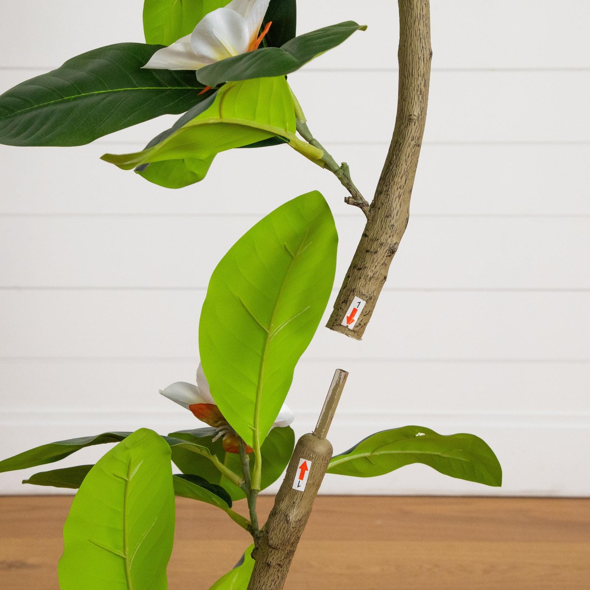 4 ft artificial minimalist magnolia tree with green leaves and white bloom on Tampa Home & Garden Store