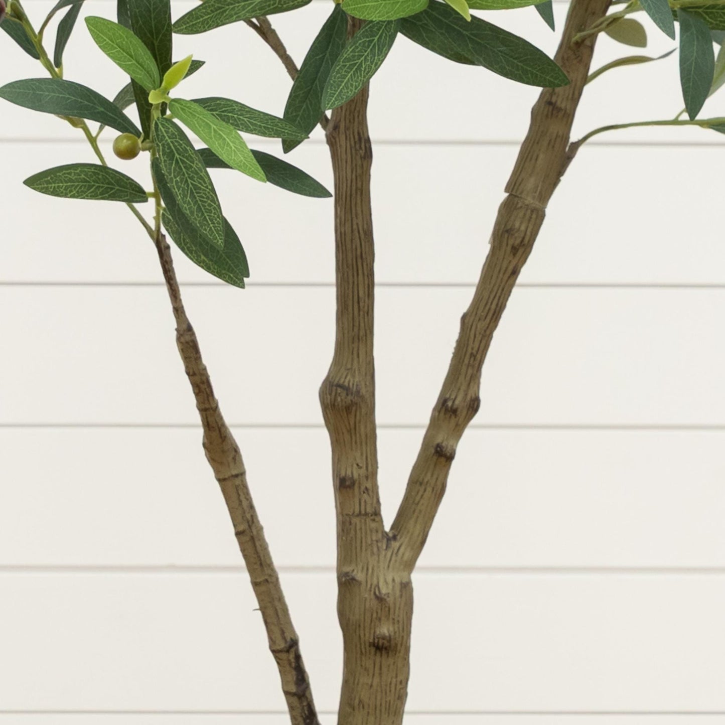 4 ft artificial olive tree with green veined leaves and small olives, brown textured trunks on Tampa Home & Garden Store