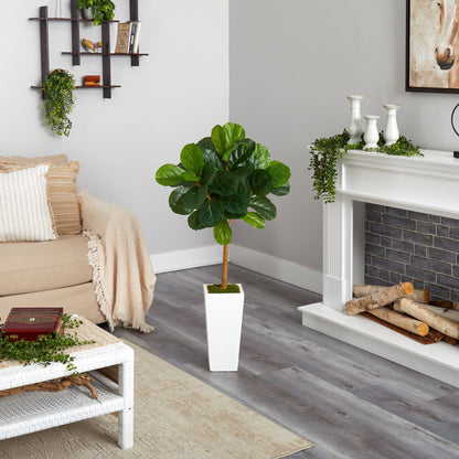 4 ft Fiddle Leaf Artificial Tree in White Tower Planter by Nearly Natural in a stylish living room on Tampa Home & Garden Store