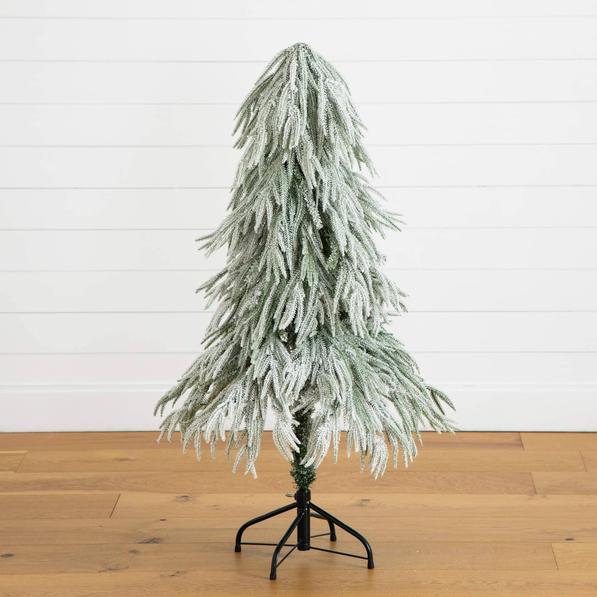 4 ft artificial flocked down-swept Christmas tree with 110 warm white LED lights on Tampa Home & Garden Store