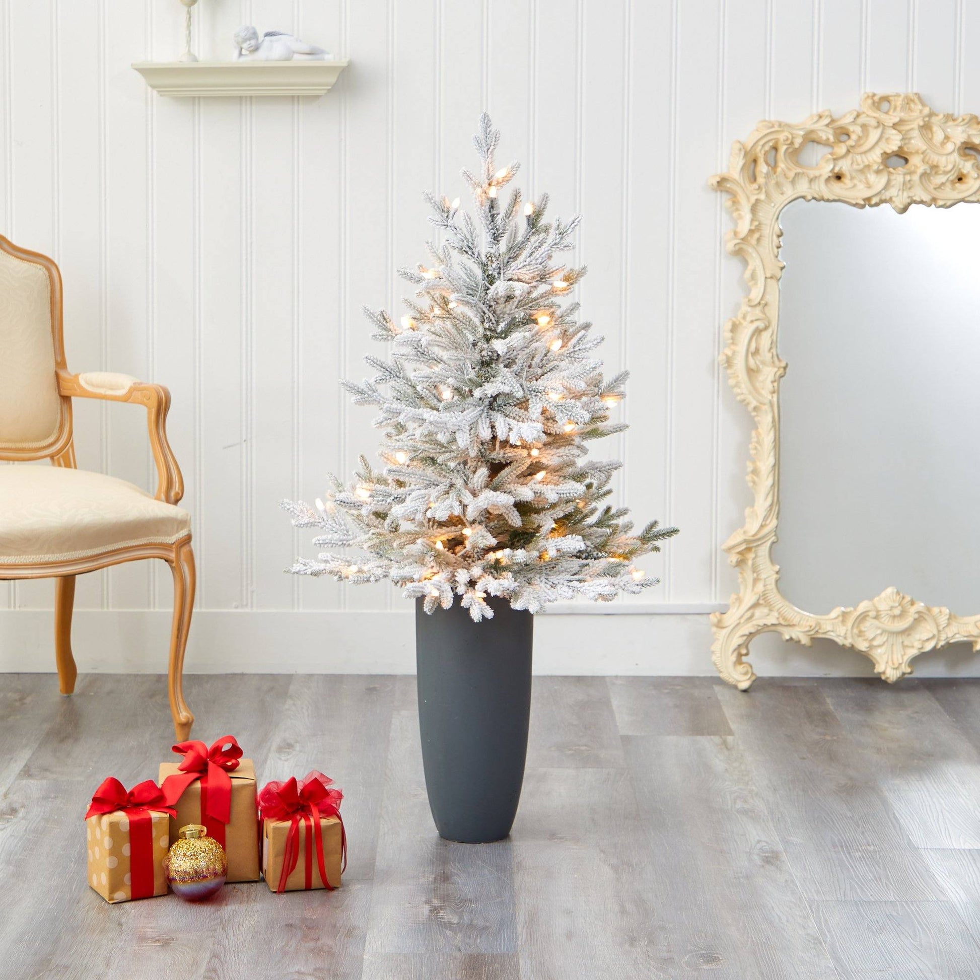 4 ft Nearly Natural flocked Fraser Fir Christmas Tree in gray planter with 200 warm white lights and 481 bendable branches on Tampa Home & Garden Store