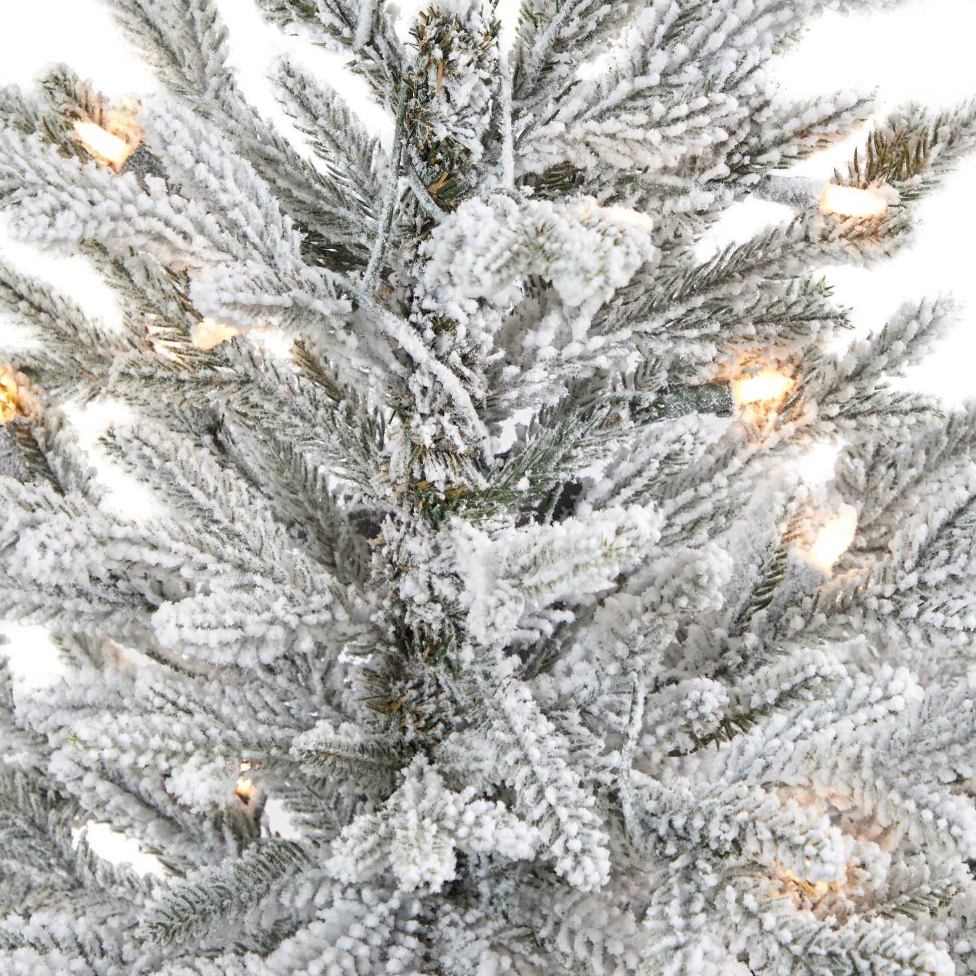 4 ft flocked Fraser Fir artificial Christmas tree with warm white lights in a gray planter on Tampa Home & Garden Store