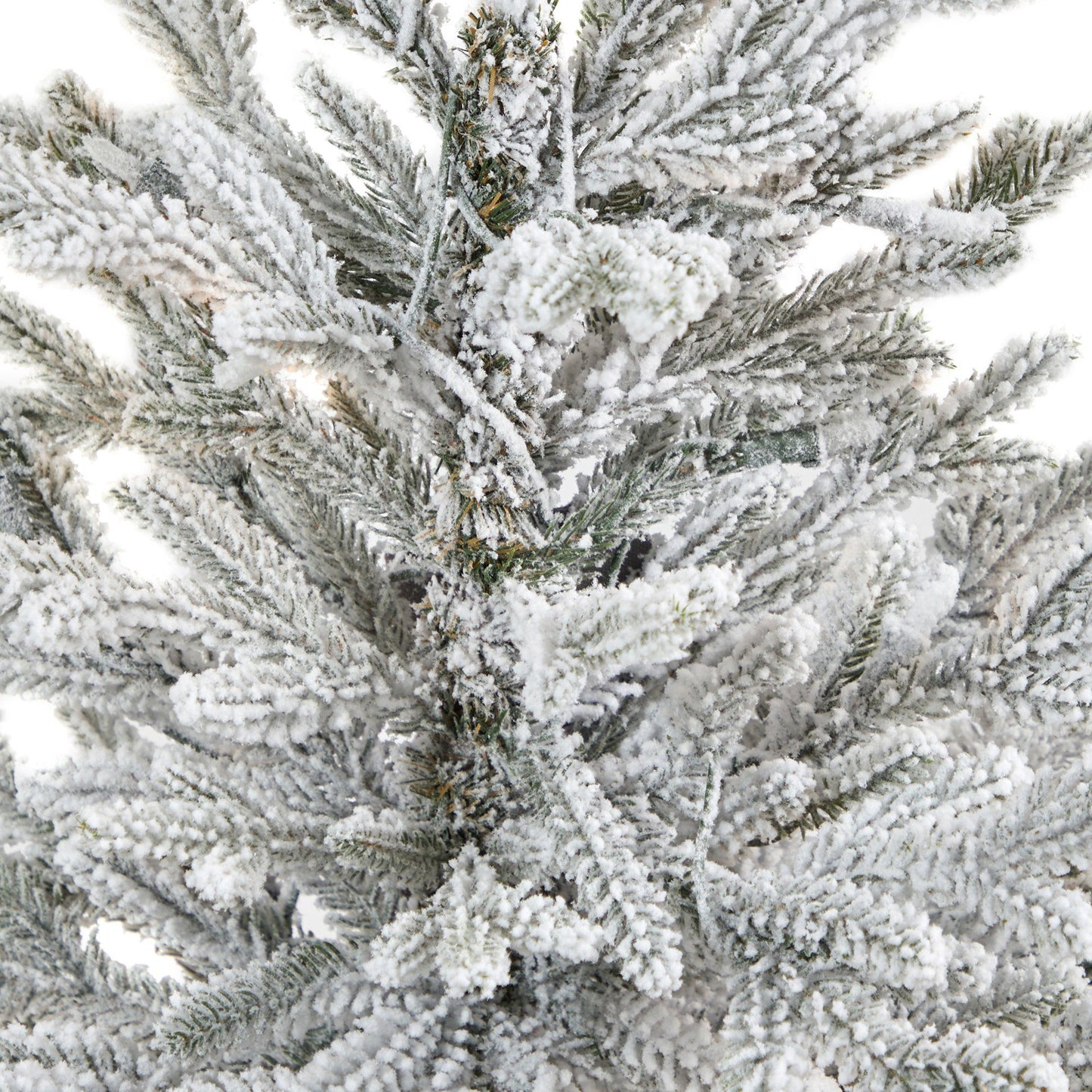4 ft flocked Fraser fir artificial Christmas tree close-up of snow-dusted evergreen needles on Tampa Home & Garden Store
