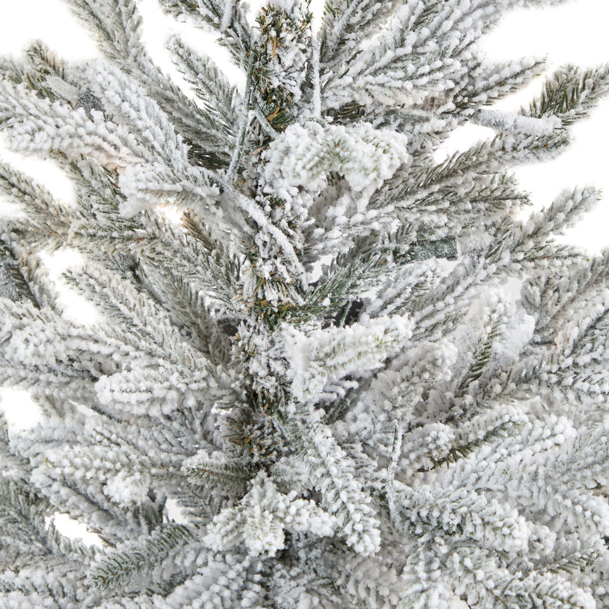4 ft flocked Fraser fir artificial Christmas tree close-up of snow-dusted evergreen needles on Tampa Home & Garden Store