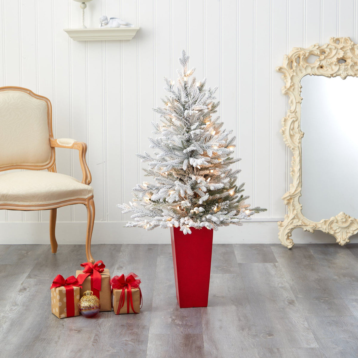 4 ft flocked Fraser Fir artificial Christmas tree with warm white lights in a red planter on Tampa Home & Garden Store