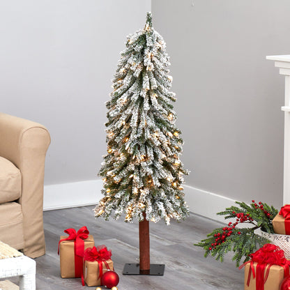 4’ flocked Grand Alpine Christmas Tree with 100 lights and 361 branches on natural trunk on Tampa Home & Garden Store