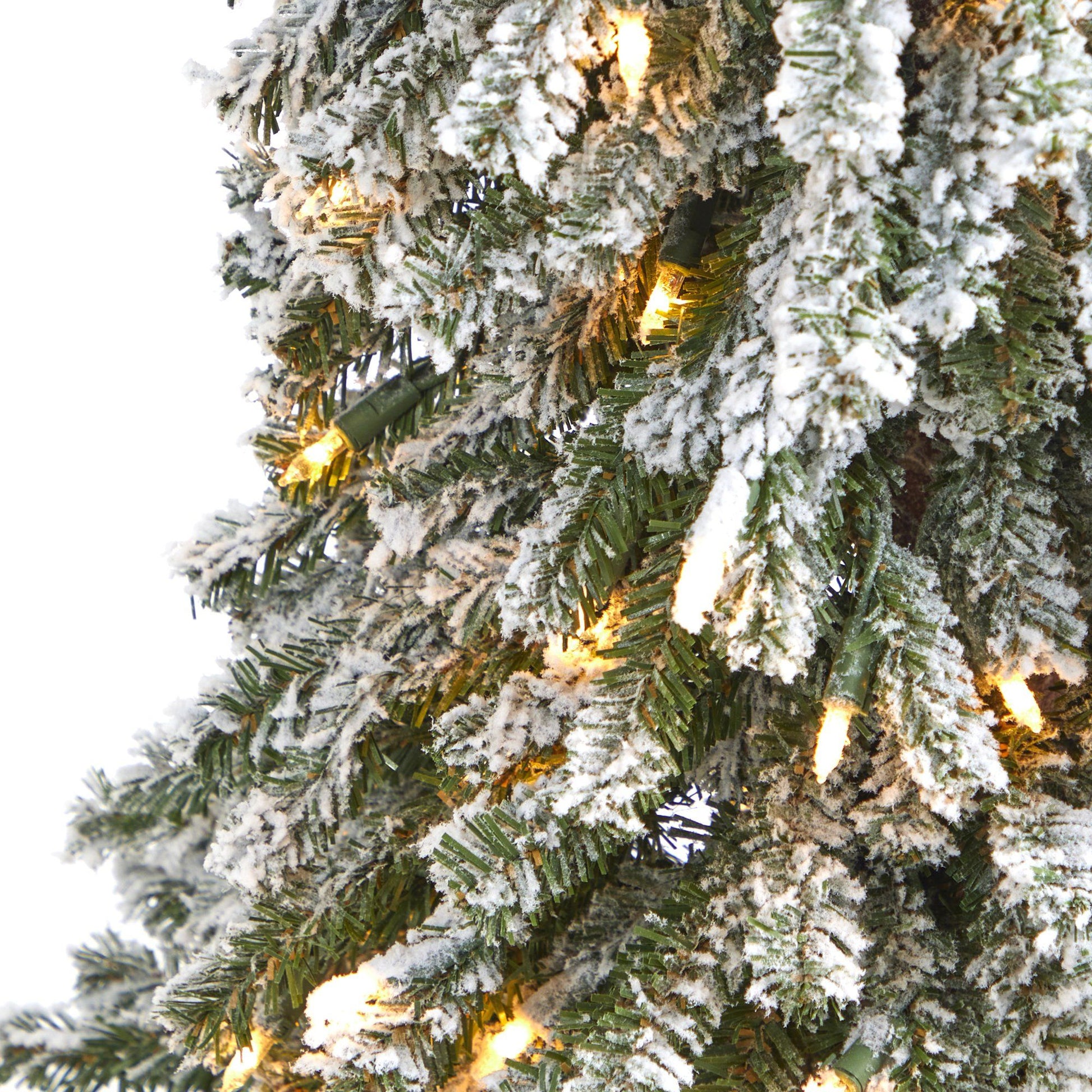 4 ft flocked Grand Alpine Christmas tree by Nearly Natural with 100 lights and 361 branches on Tampa Home & Garden Store