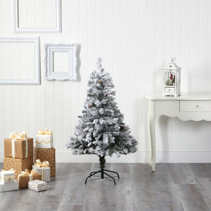 4 ft Nearly Natural flocked white river mountain pine Christmas tree with pinecones beside wrapped gifts on Tampa Home & Garden Store