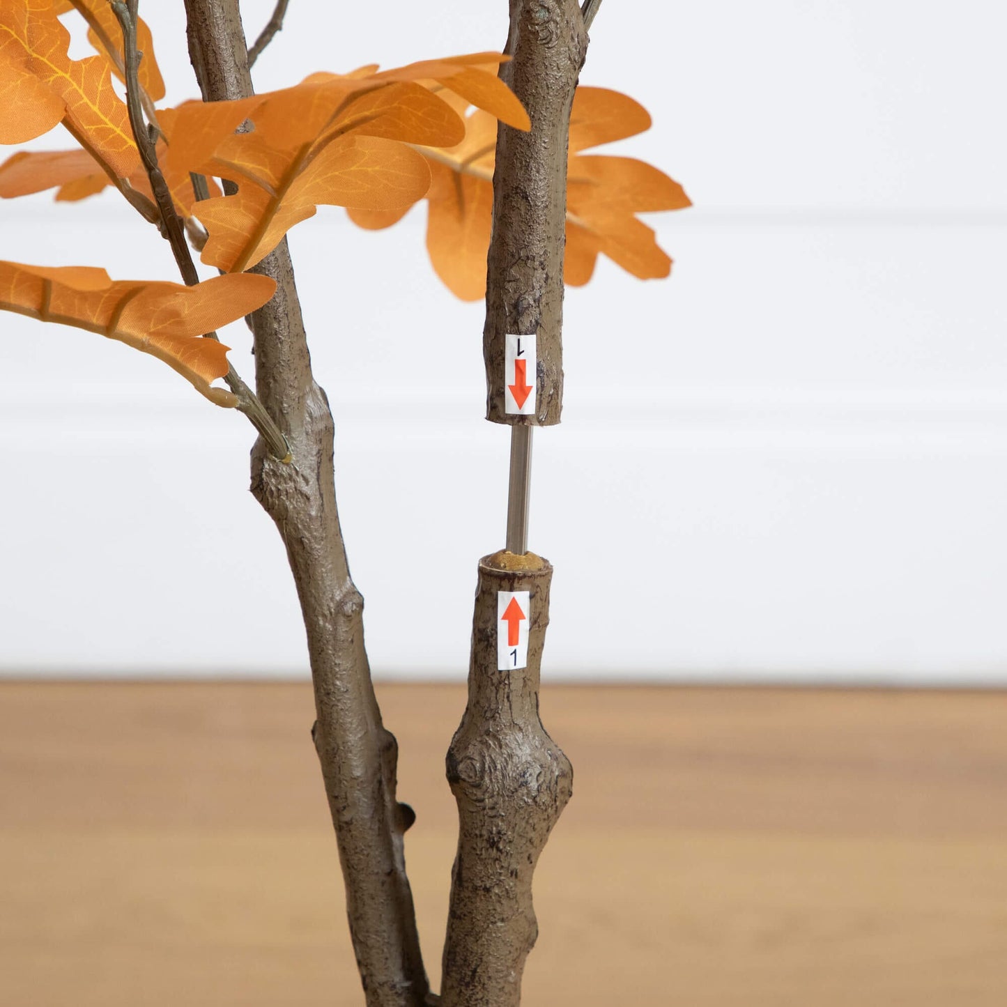 4' Artificial Autumn Oak Tree with orange leaves and textured brown trunk on Tampa Home & Garden Store