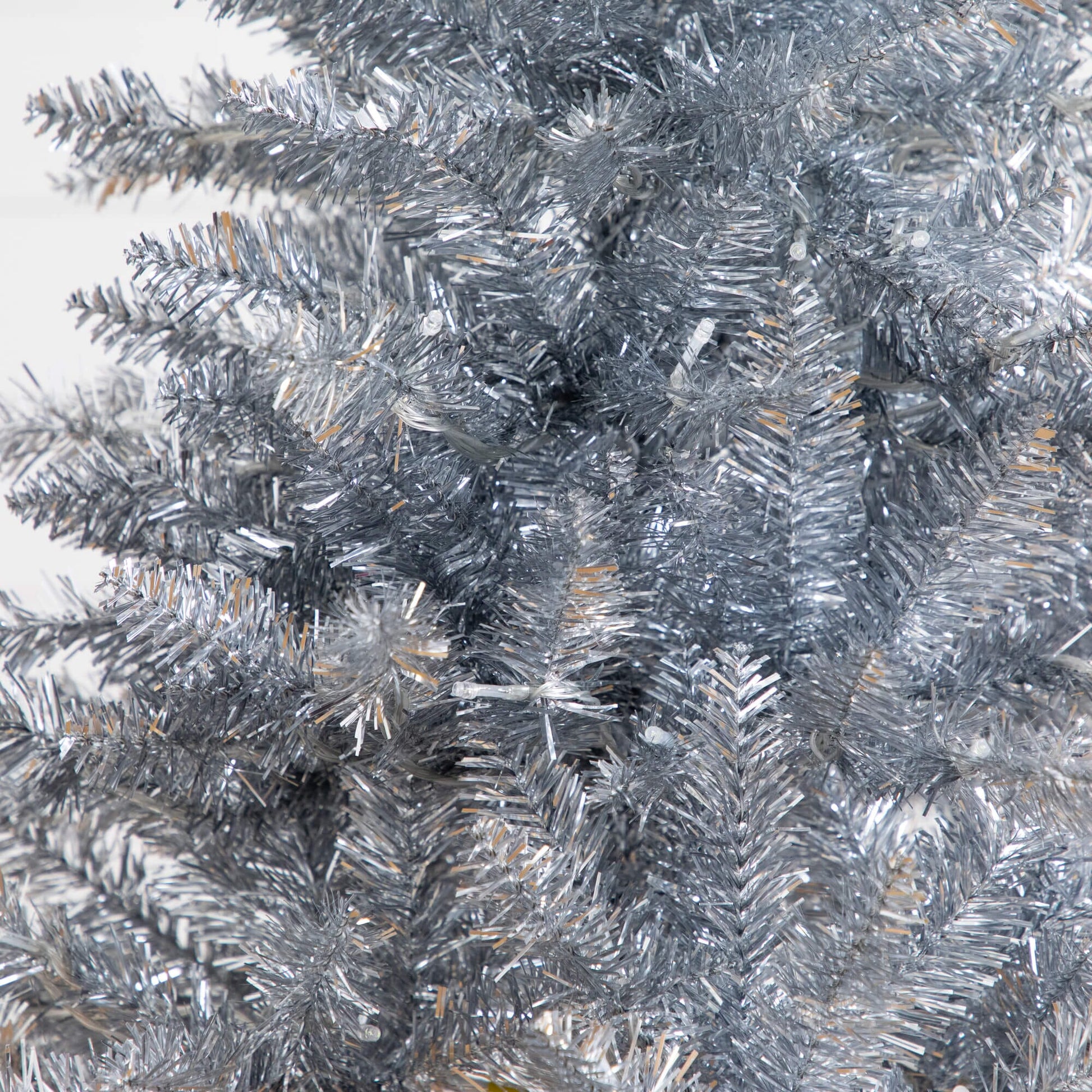4' artificial silver Christmas tree with 130 cool white LEDs, Nearly Natural metallic tinsel branches on Tampa Home & Garden Store