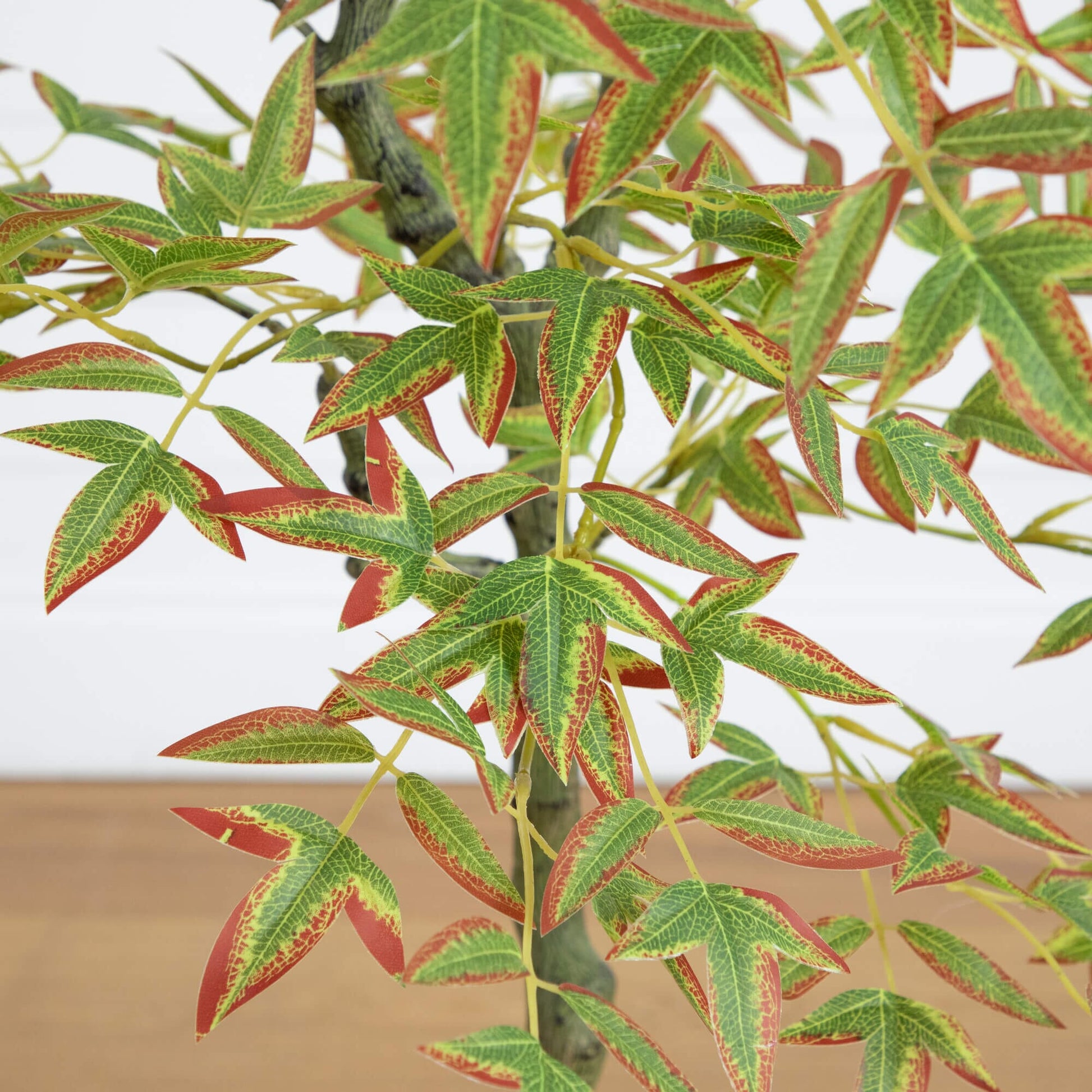 4 ft Autumn Nandina artificial tree close-up with green and red variegated leaves Nearly Natural on Tampa Home & Garden Store