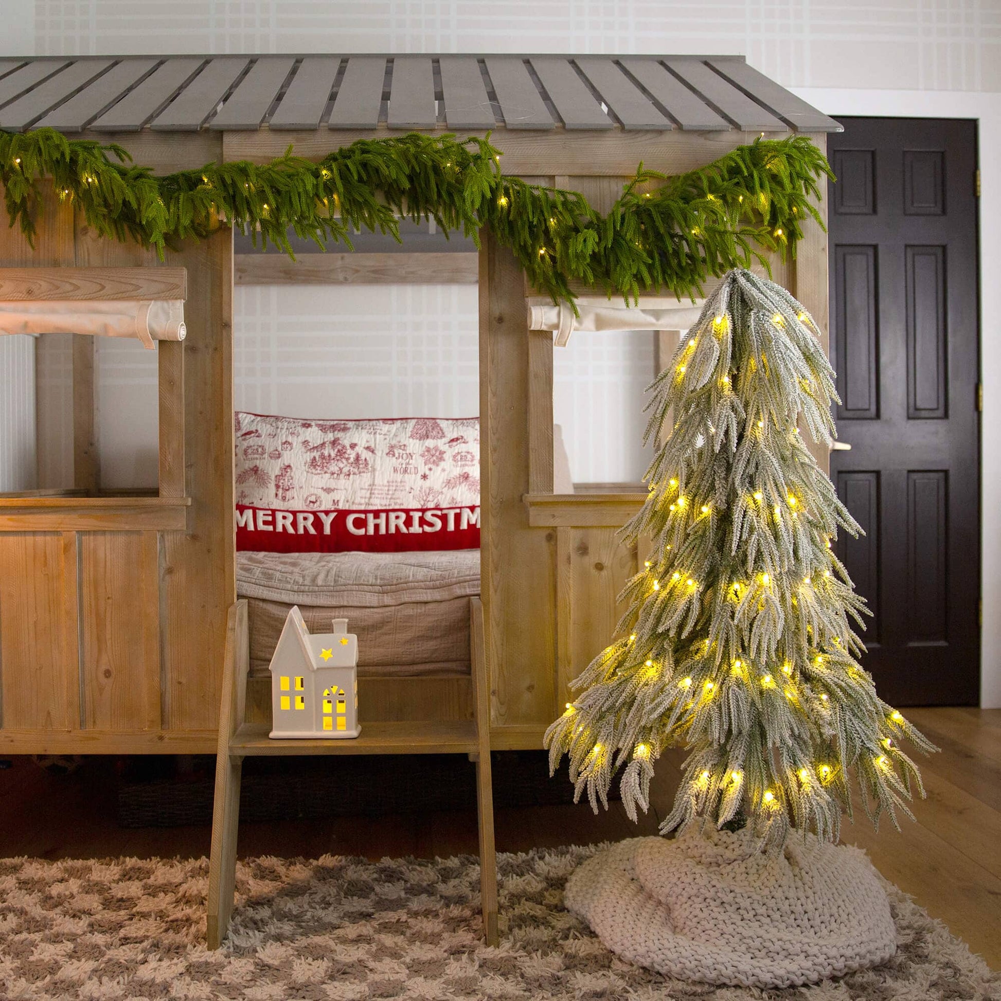 4' artificial pre-lit flocked down-swept Christmas tree with 110 warm white LED lights on Tampa Home & Garden Store
