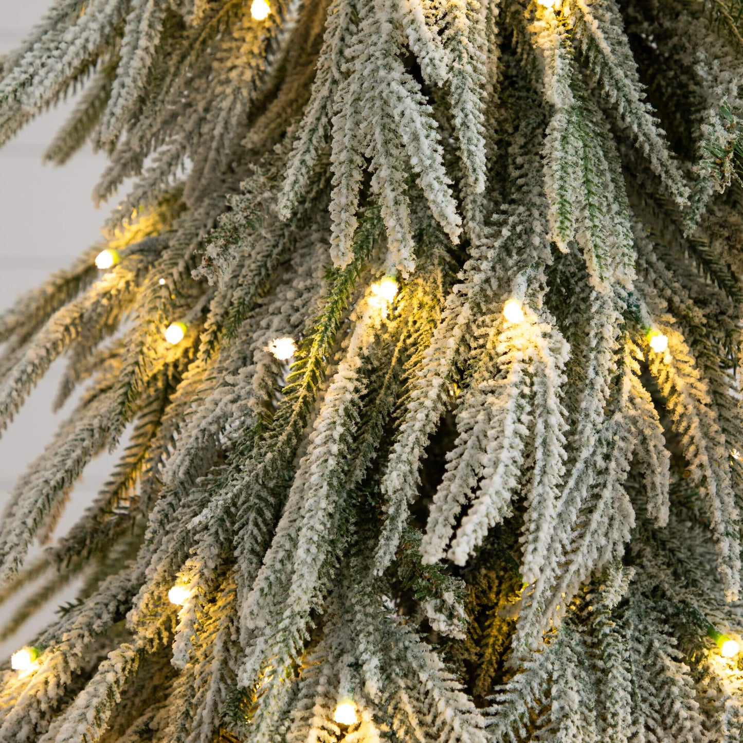 4' artificial flocked down-swept Christmas tree with 110 warm white LED lights by Nearly Natural on Tampa Home & Garden Store