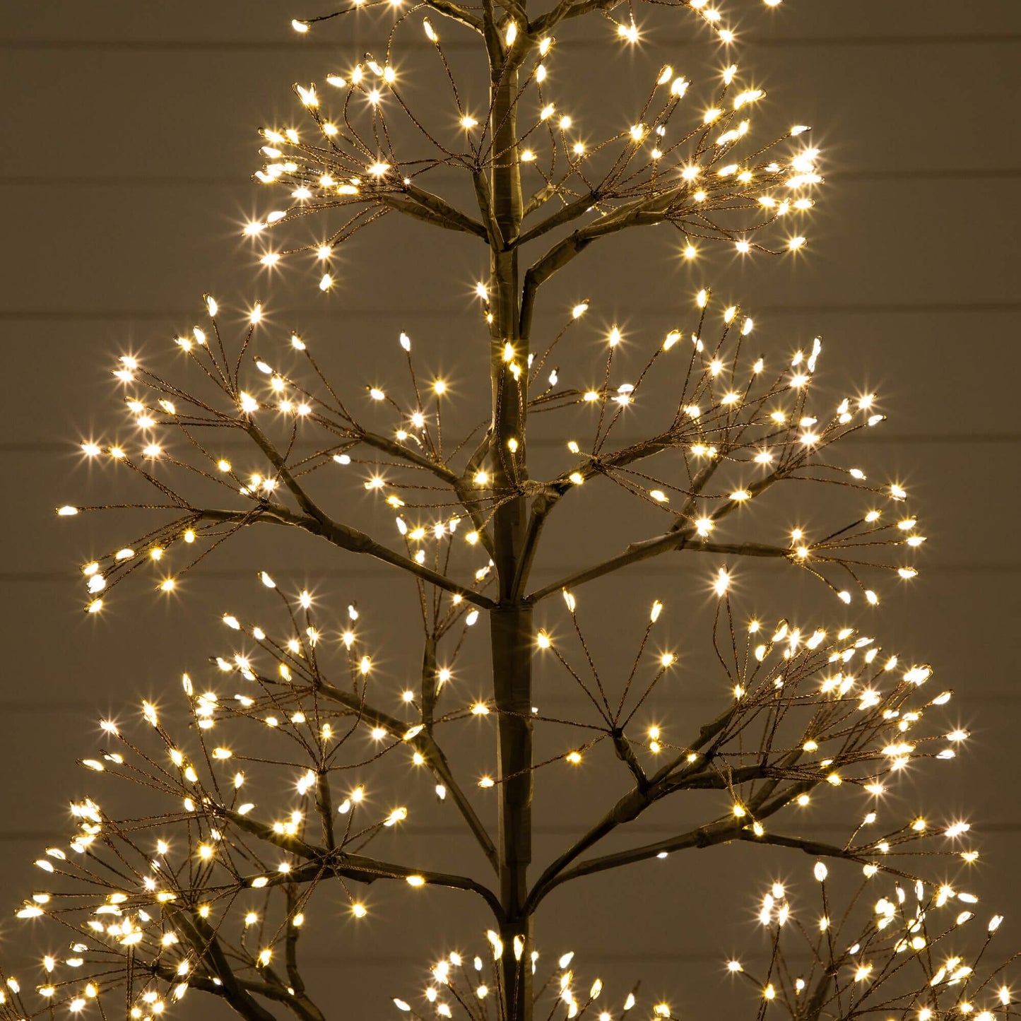 Nearly Natural 4' pre-lit Halloween black starburst artificial tree with 800 warm white LEDs on Tampa Home & Garden Store