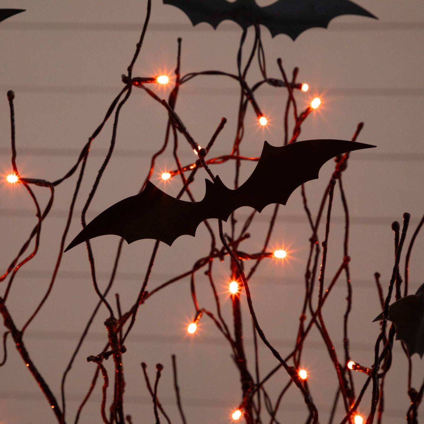 4 ft Nearly Natural pre-lit Halloween black twig tree with bat silhouettes and 50 orange LEDs on Tampa Home & Garden Store