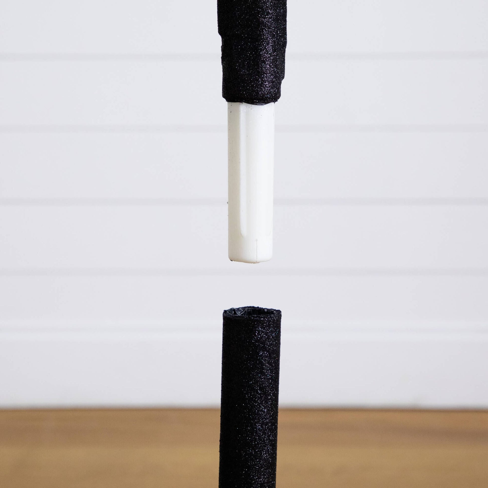 4 ft pre-lit Halloween spider twig tree trunk wrapped in black glitter fabric on Tampa Home & Garden Store