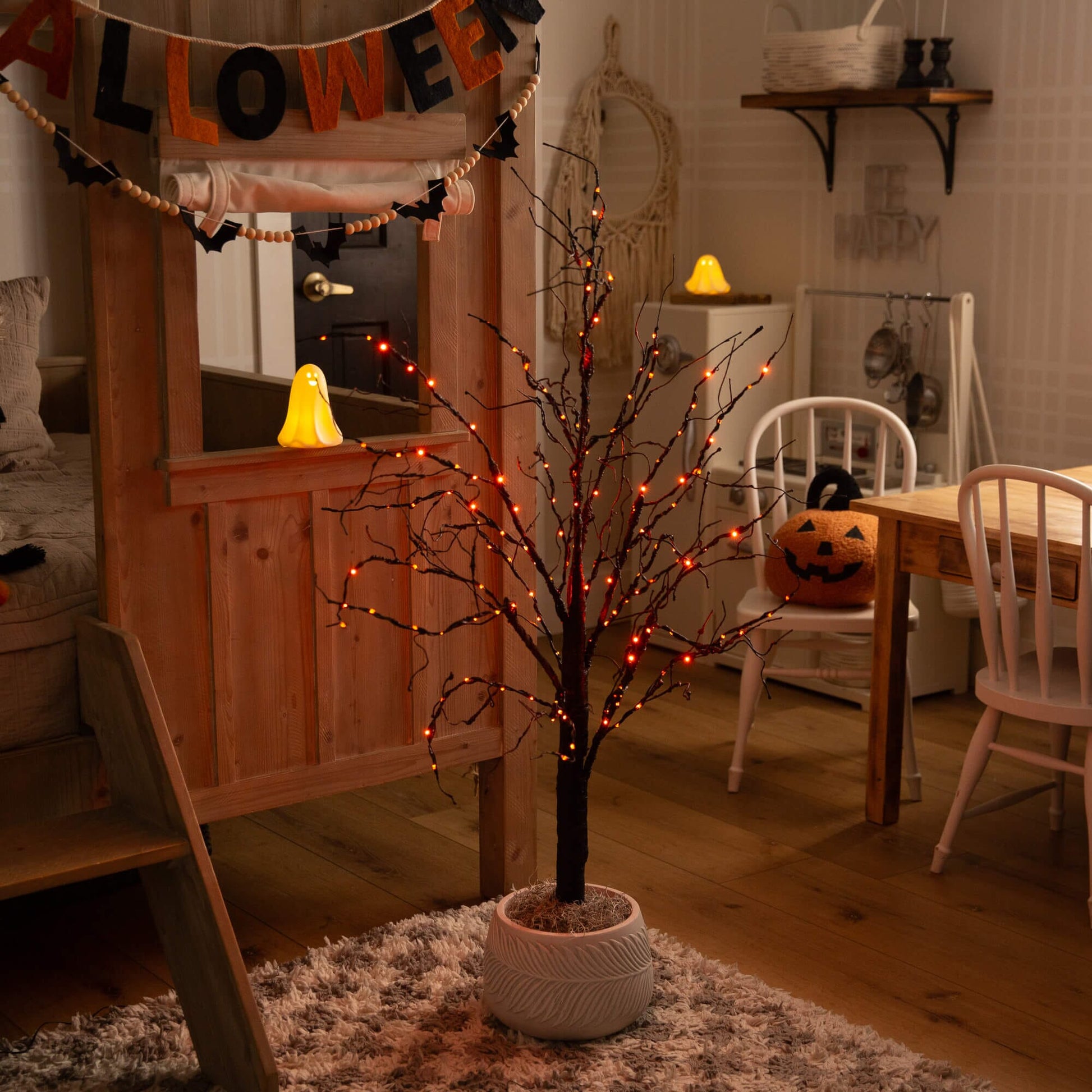 4' Pre-Lit Halloween Black Twig Tree with 180 orange & purple LEDs in pink planter on Tampa Home & Garden Store