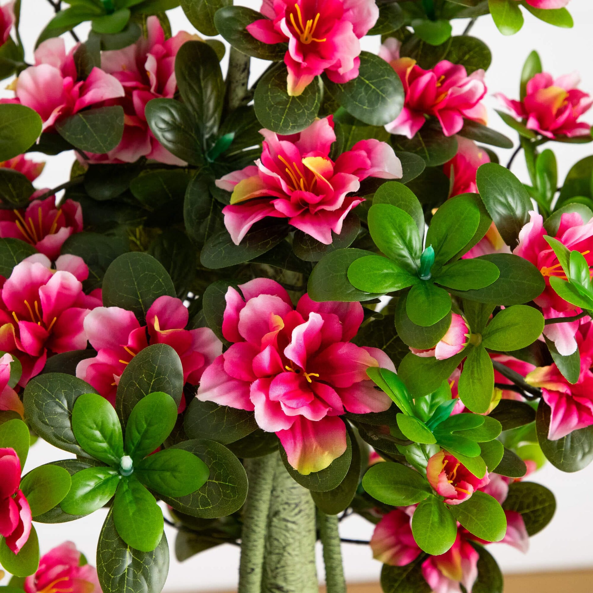 4 ft UV resistant artificial azalea tree by Nearly Natural with pink blooms and dark leaves on Tampa Home & Garden Store
