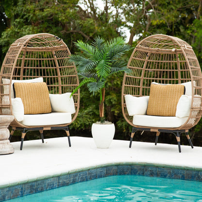 Artificial Robellini palm tree with green fronds amid wicker chairs on Tampa Home & Garden Store