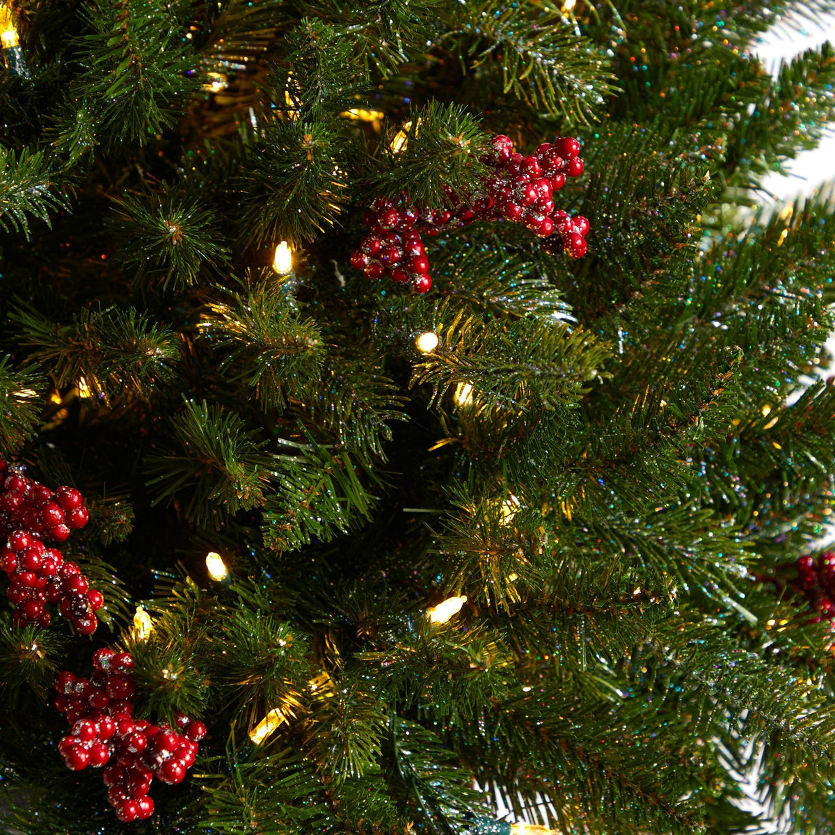 4' Nearly Natural Christmas Tree pre-lit with multicolored LEDs and glittered branches with red berry garlands on Tampa Home & Garden Store