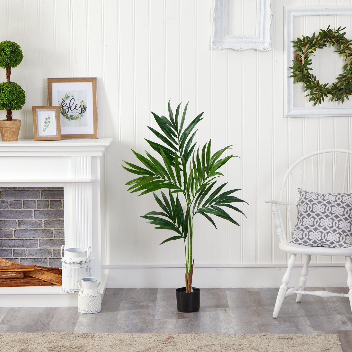 4 ft Kentia Artificial Palm Tree by Nearly Natural in black pot indoors on Tampa Home & Garden Store