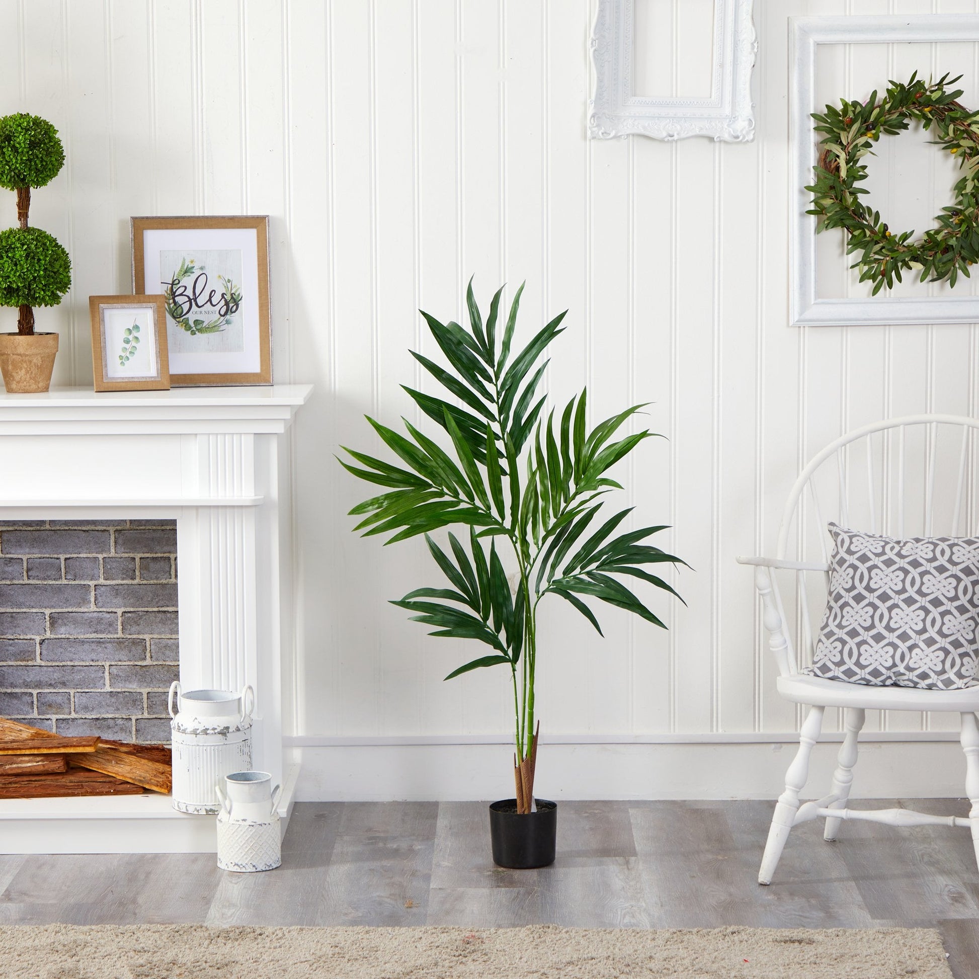 4 ft Kentia Artificial Palm Tree by Nearly Natural in black pot indoors on Tampa Home & Garden Store