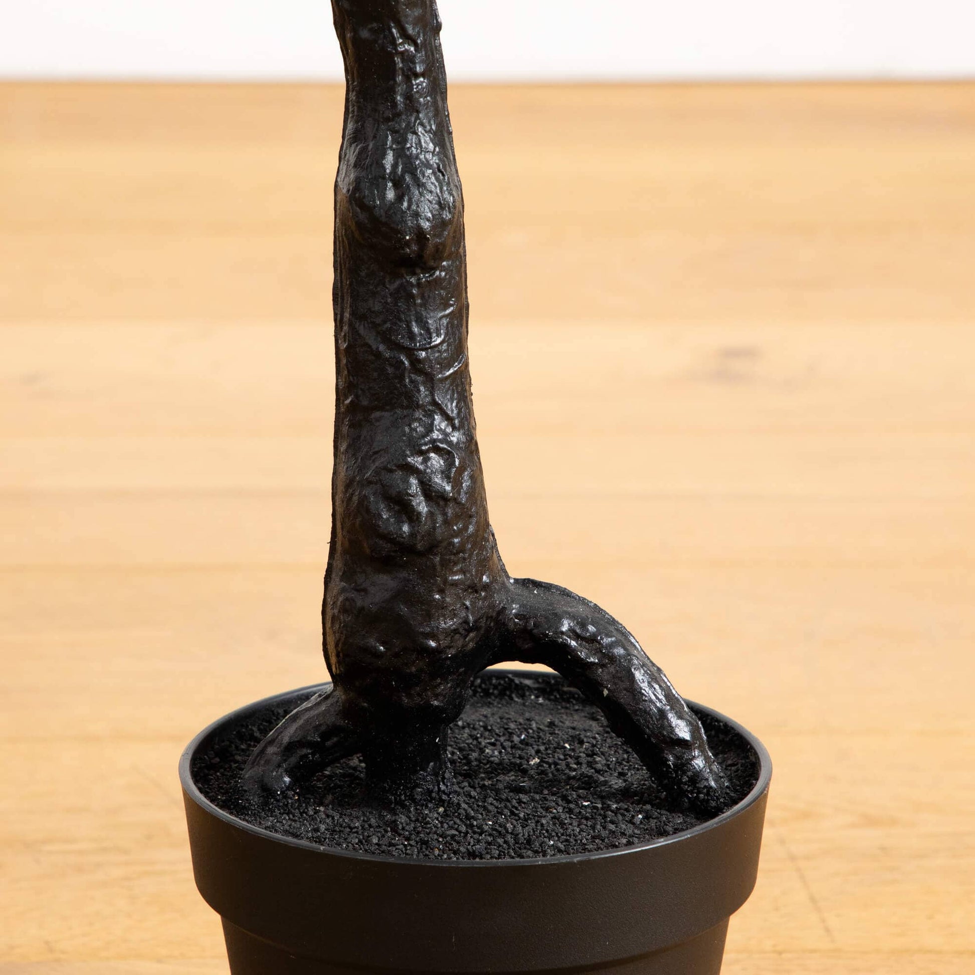 4' Nearly Natural black artificial spooky twig tree in a round brown pot with soil on Tampa Home & Garden Store