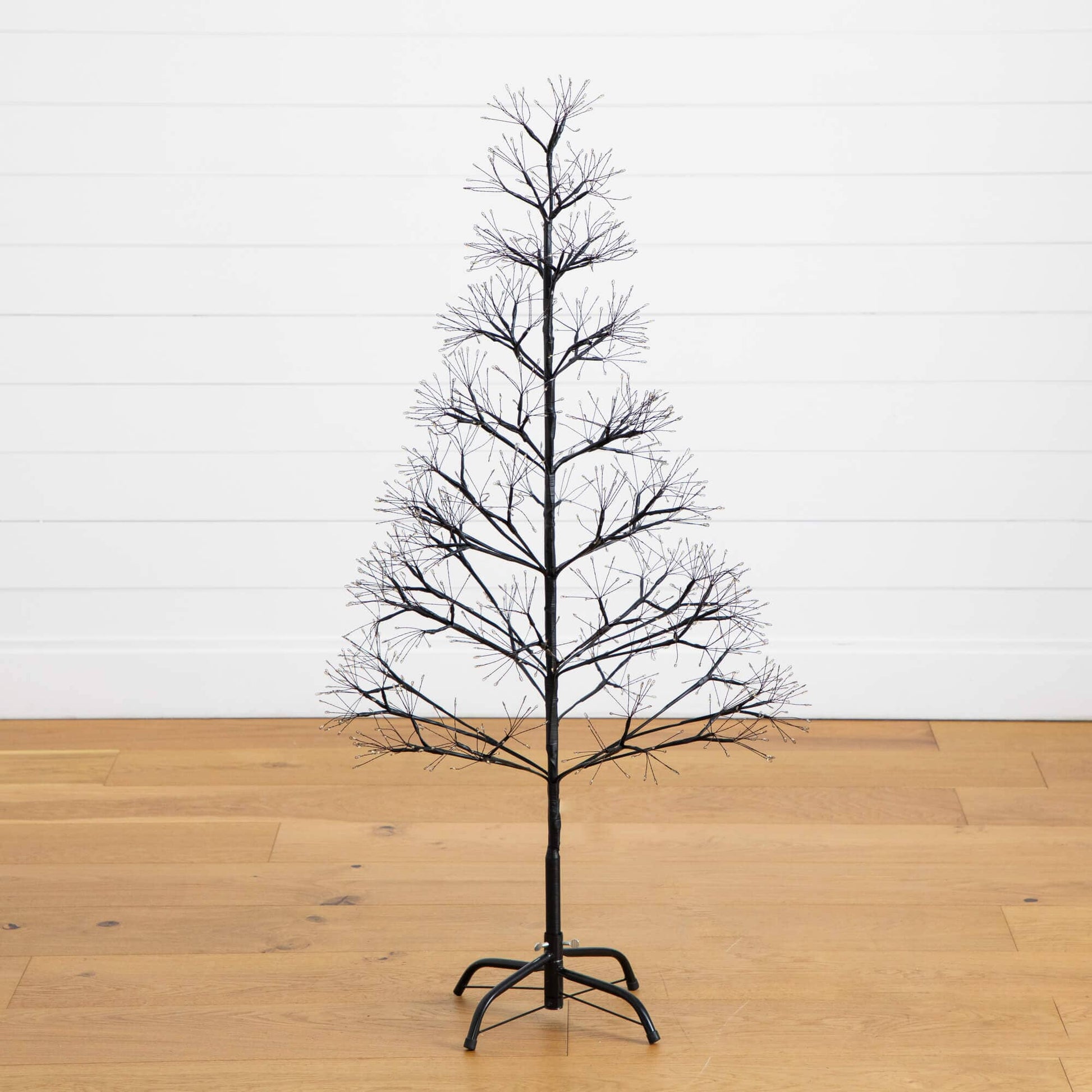 4' Nearly Natural black starburst pre-lit Halloween tree with 800 warm white LEDs on Tampa Home & Garden Store