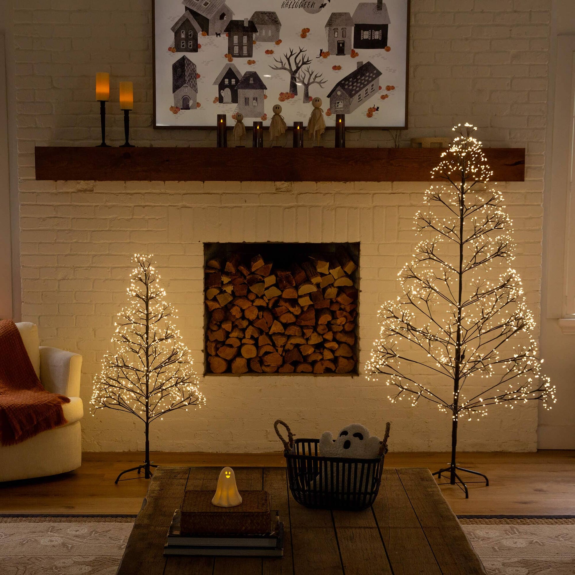 Two 4' pre-lit Halloween black starburst trees with 800 warm white LEDs on Tampa Home & Garden Store
