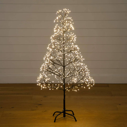 4' pre-lit artificial Halloween black starburst tree with 800 warm white LEDs on a stand on Tampa Home & Garden Store