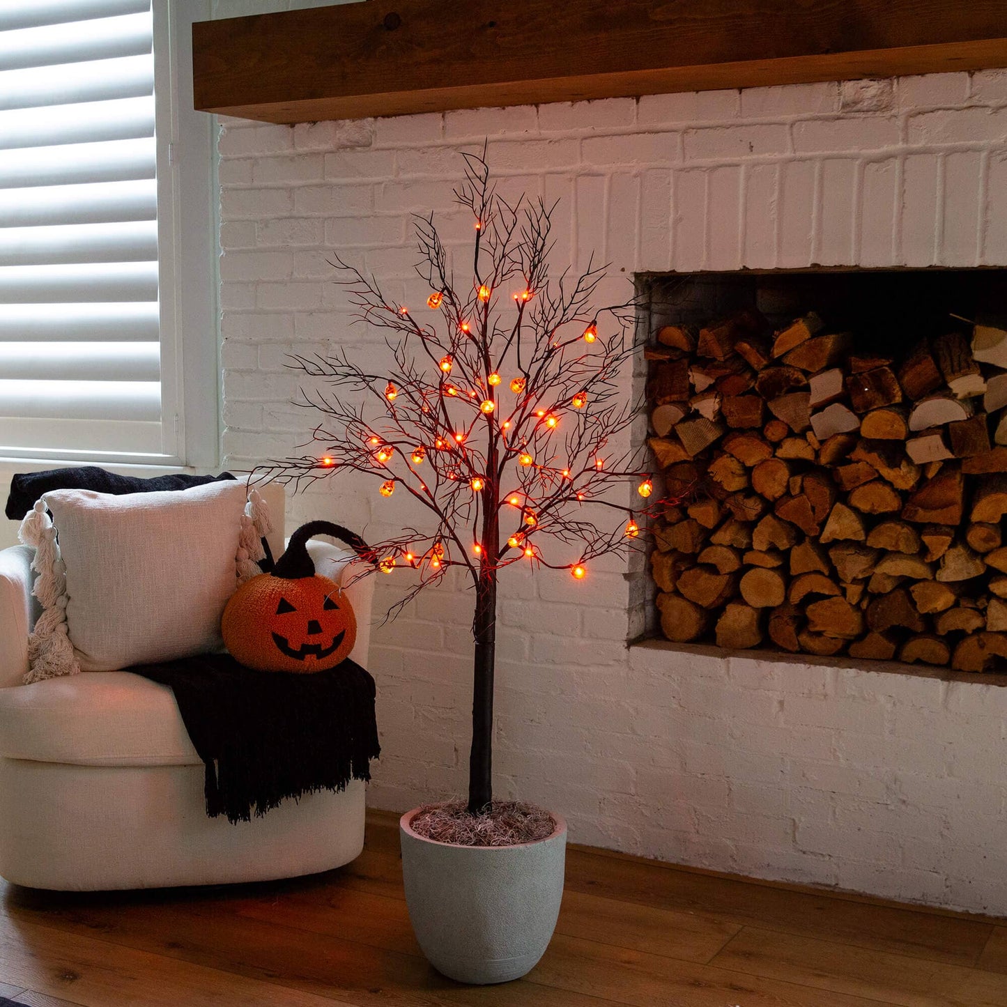 Nearly Natural 4' Pre-Lit Halloween Black Twig Tree with 24 Orange LED Pumpkin Lights in a pot on Tampa Home & Garden Store