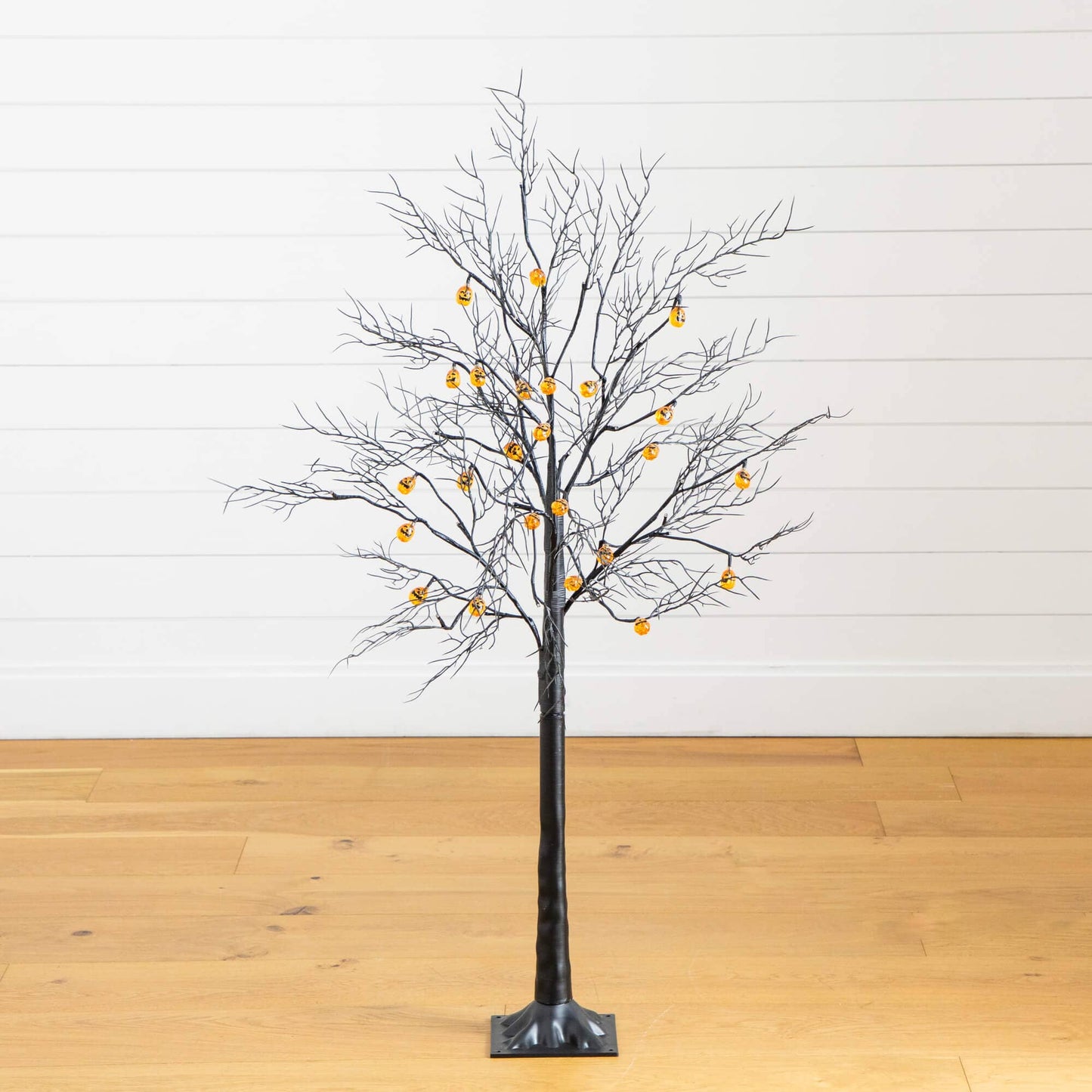 4ft Nearly Natural pre-lit black twig Halloween tree with 24 orange pumpkin LED lights on Tampa Home & Garden Store