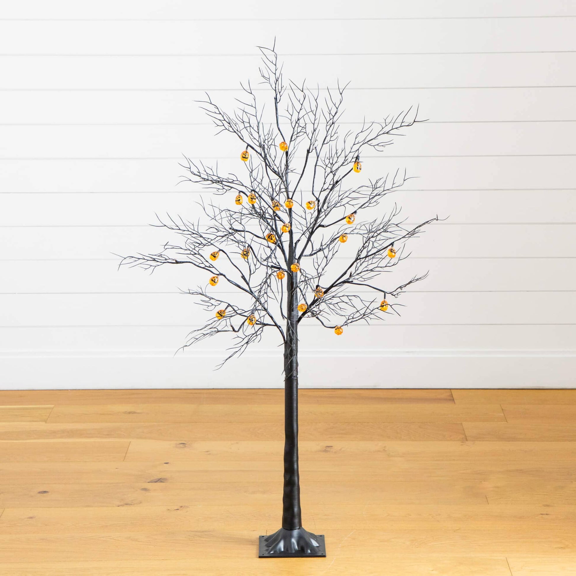 4ft Nearly Natural pre-lit black twig Halloween tree with 24 orange pumpkin LED lights on Tampa Home & Garden Store
