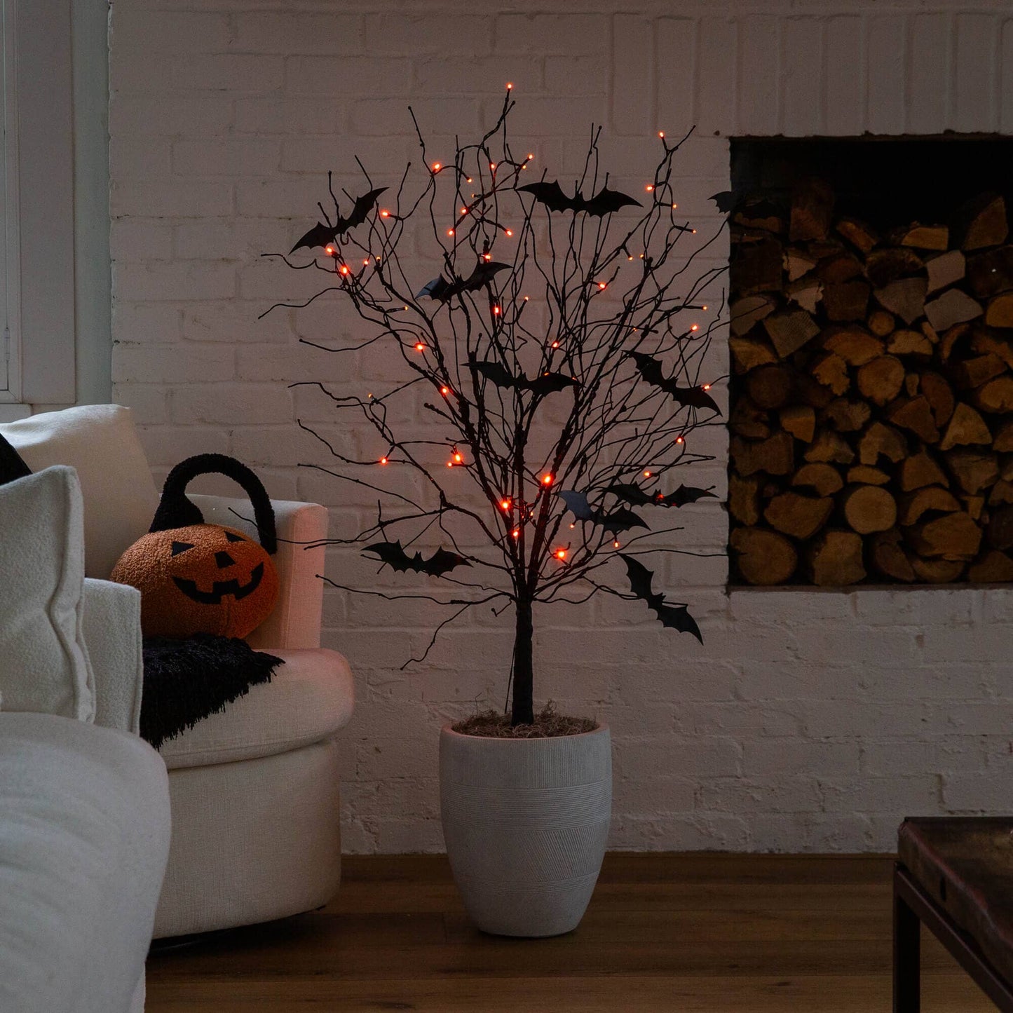 4' Pre-Lit Artificial Halloween Black Twig Tree with Bats and 50 Orange LED Lights in gray pot on Tampa Home & Garden Store