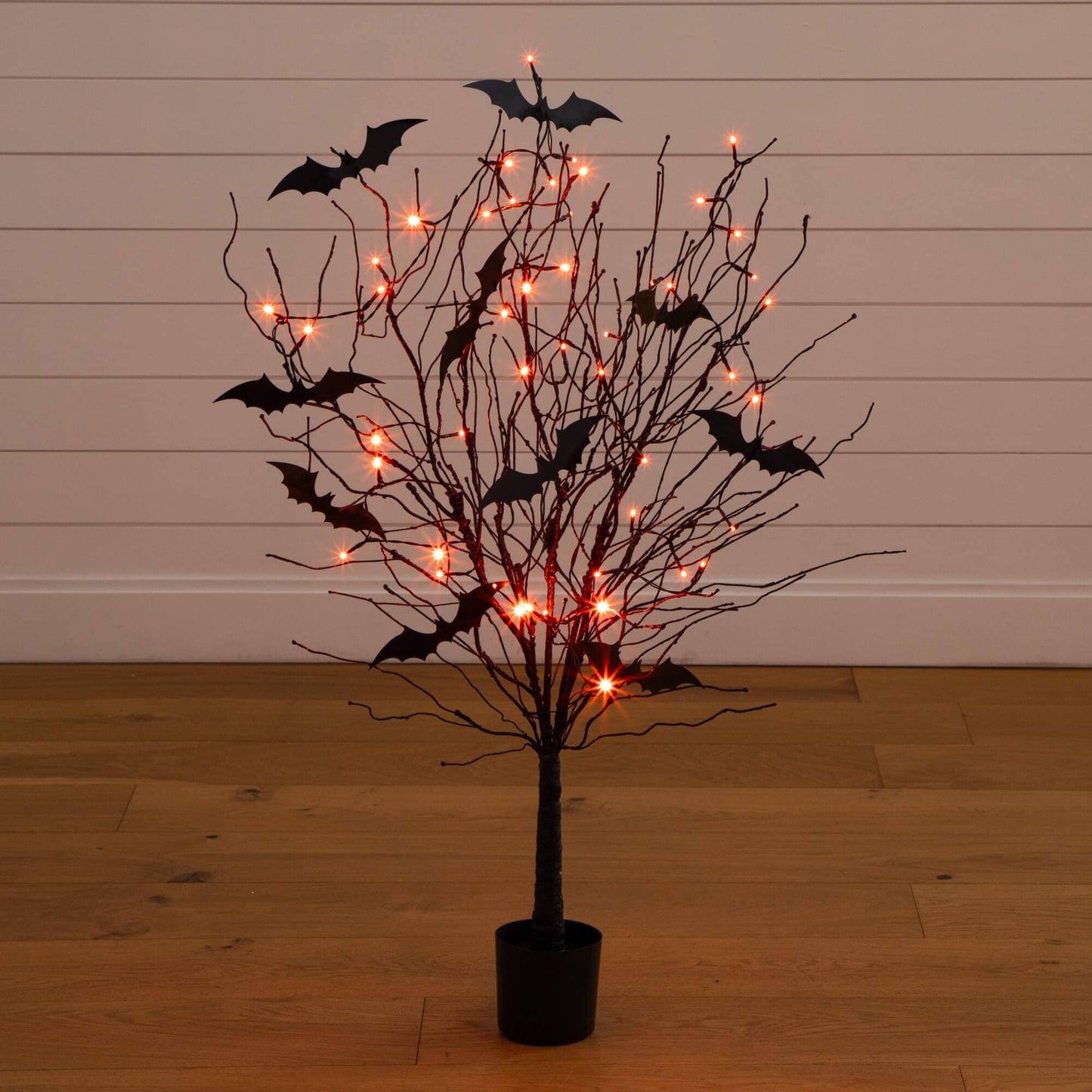 4 ft pre-lit Nearly Natural black twig Halloween tree with bats and 50 orange LED lights in pot on Tampa Home & Garden Store