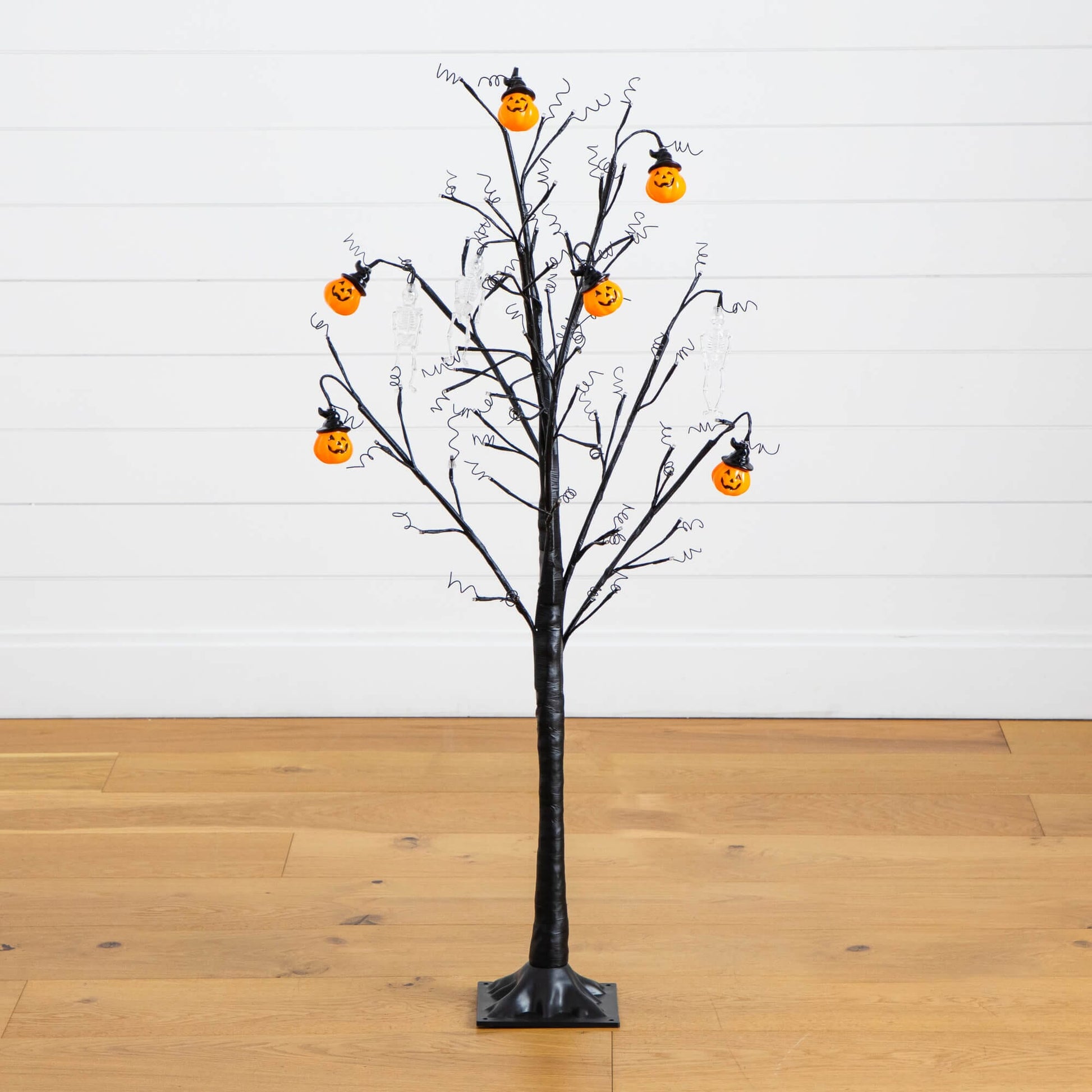 4 ft pre-lit Halloween pumpkin skull ornament tree with 64 warm white LEDs, black branches on Tampa Home & Garden Store