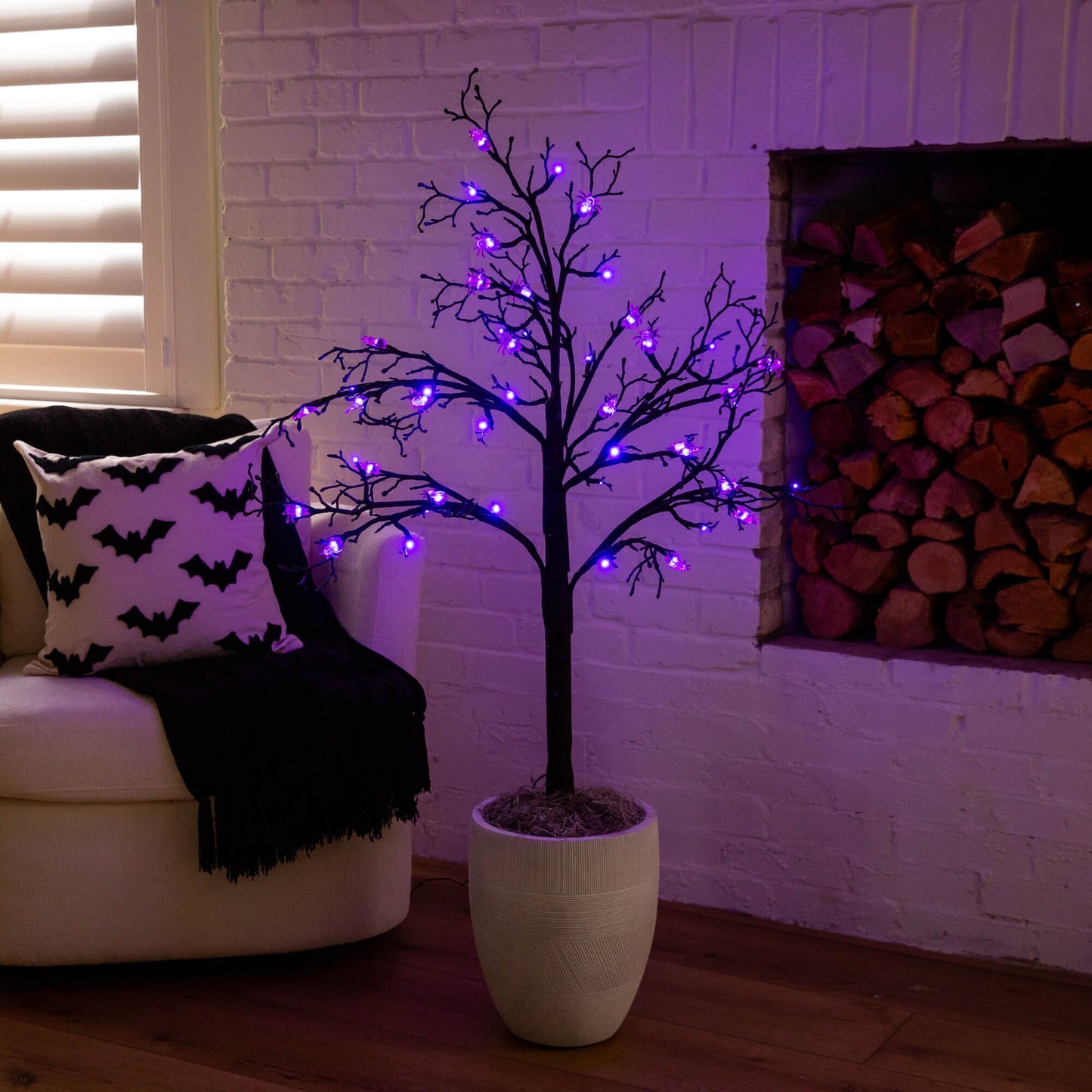 Nearly Natural 4' pre-lit Halloween spider twig tree with 48 purple LEDs in a white planter on Tampa Home & Garden Store