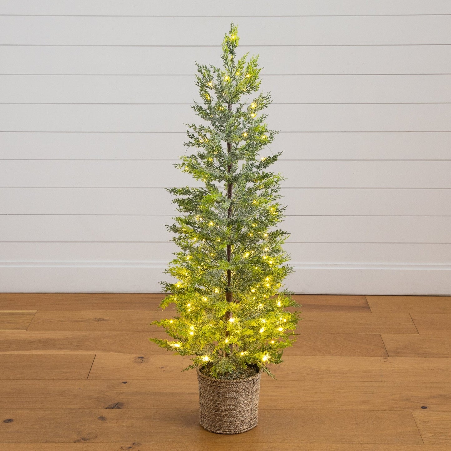 4’ Pre-Lit artificial snowed cypress Christmas tree in a hyacinth basket with 120 LED lights on Tampa Home & Garden Store