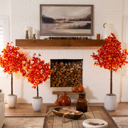 Two 4' Pre-Lit Autumn Artificial Fall Trees with 160 warm white LED lights flank a mantel on Tampa Home & Garden Store