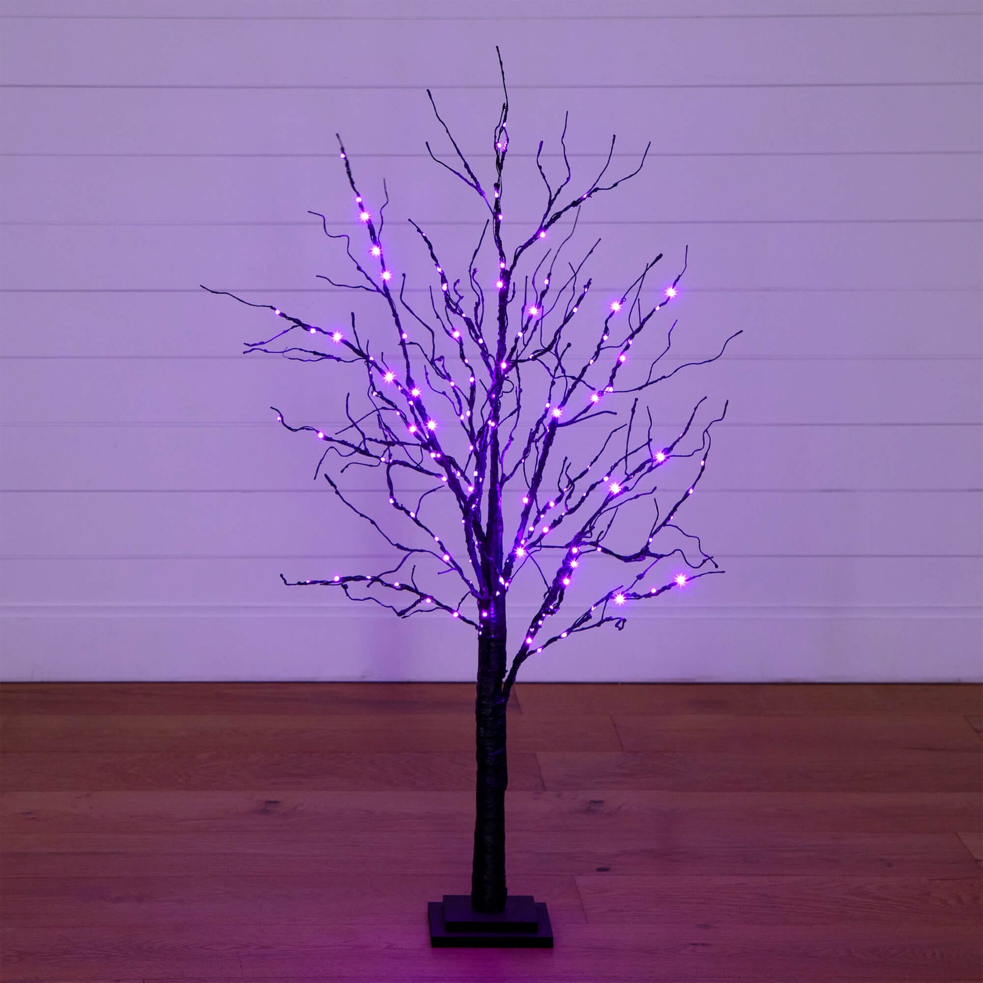 Nearly Natural 4 ft pre-lit Halloween black twig tree with 180 orange and purple LEDs on Tampa Home & Garden Store